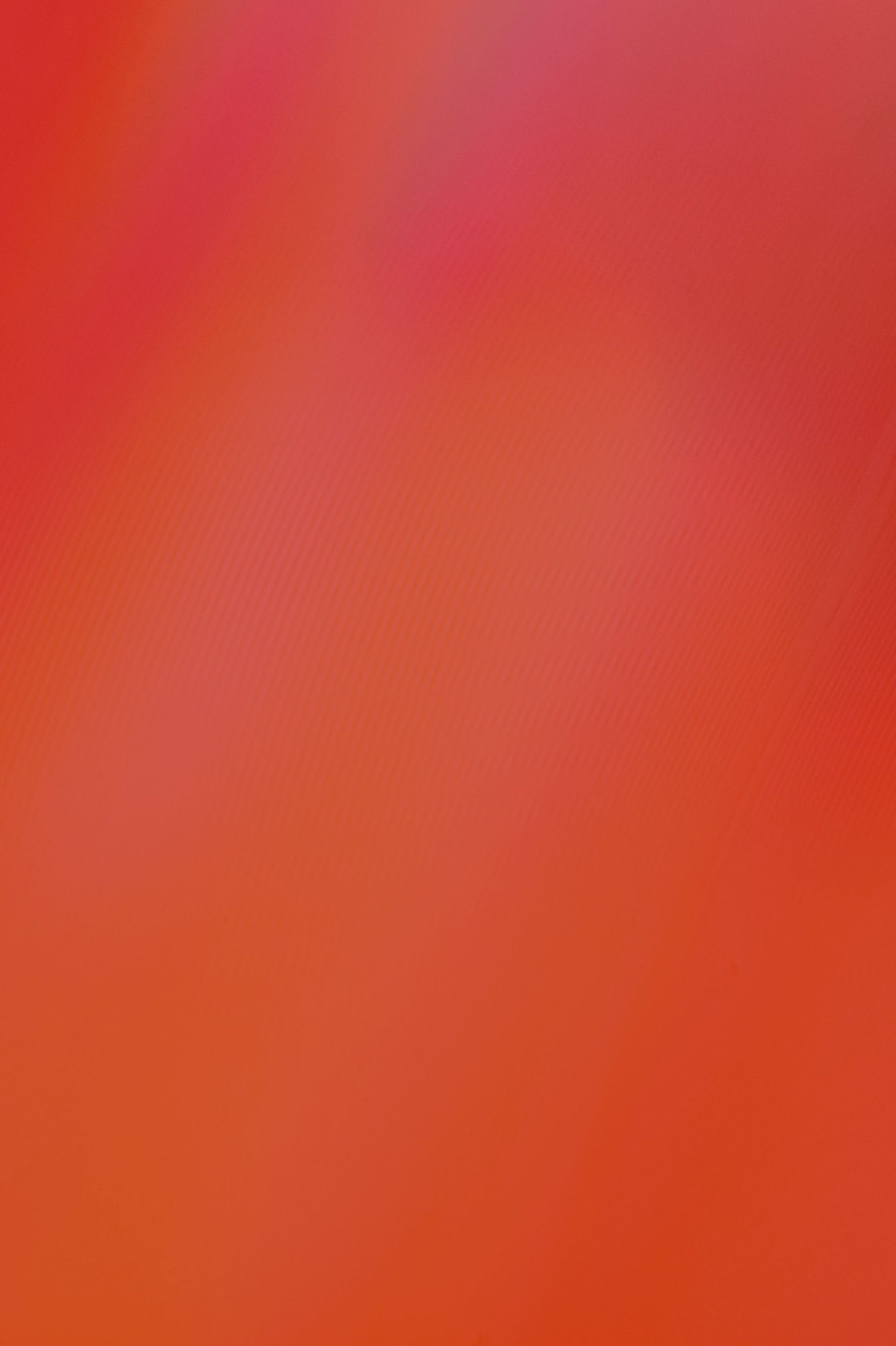 a blurry image of an orange and red background