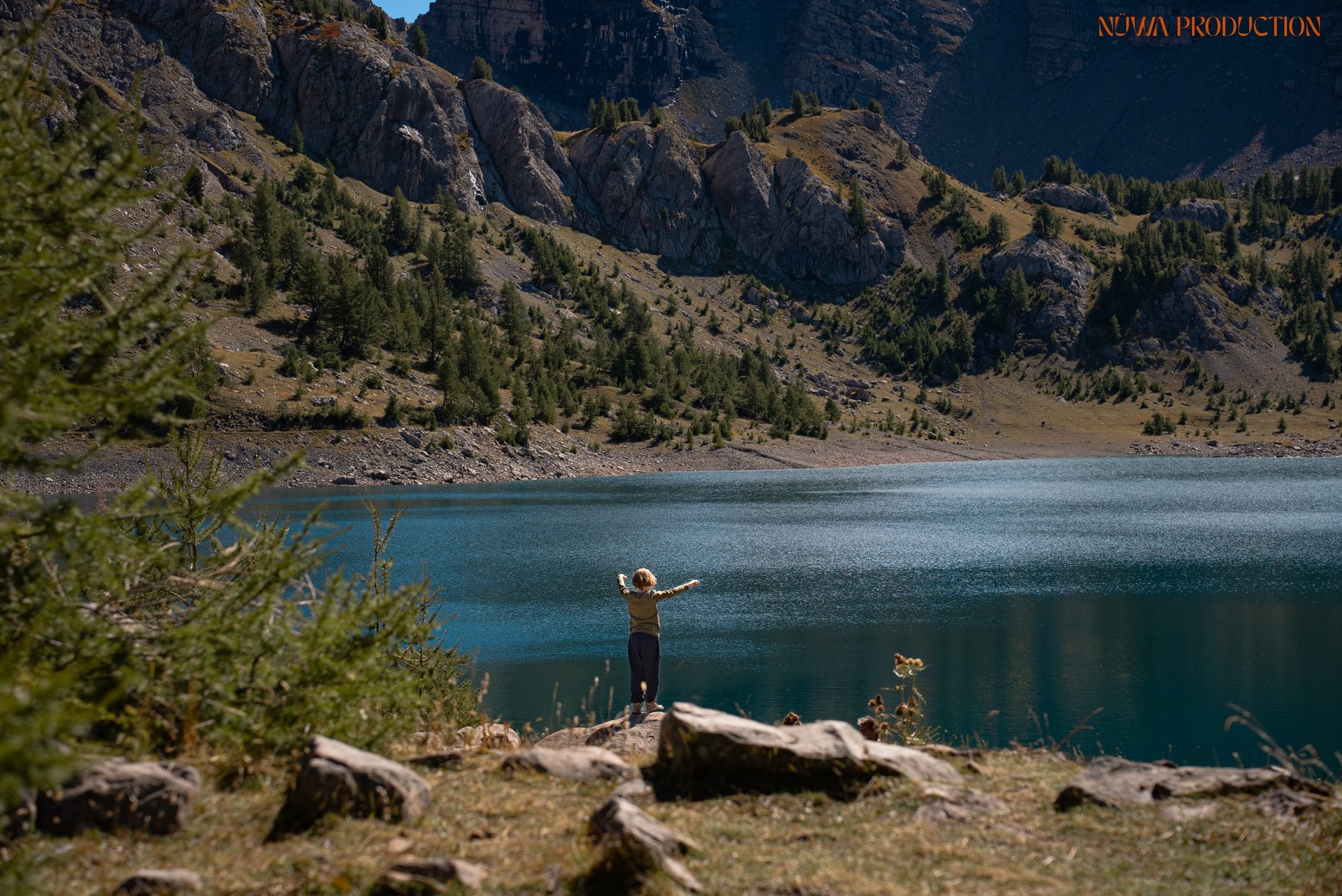 an abstract photo of a curved building with a blue sky in the background