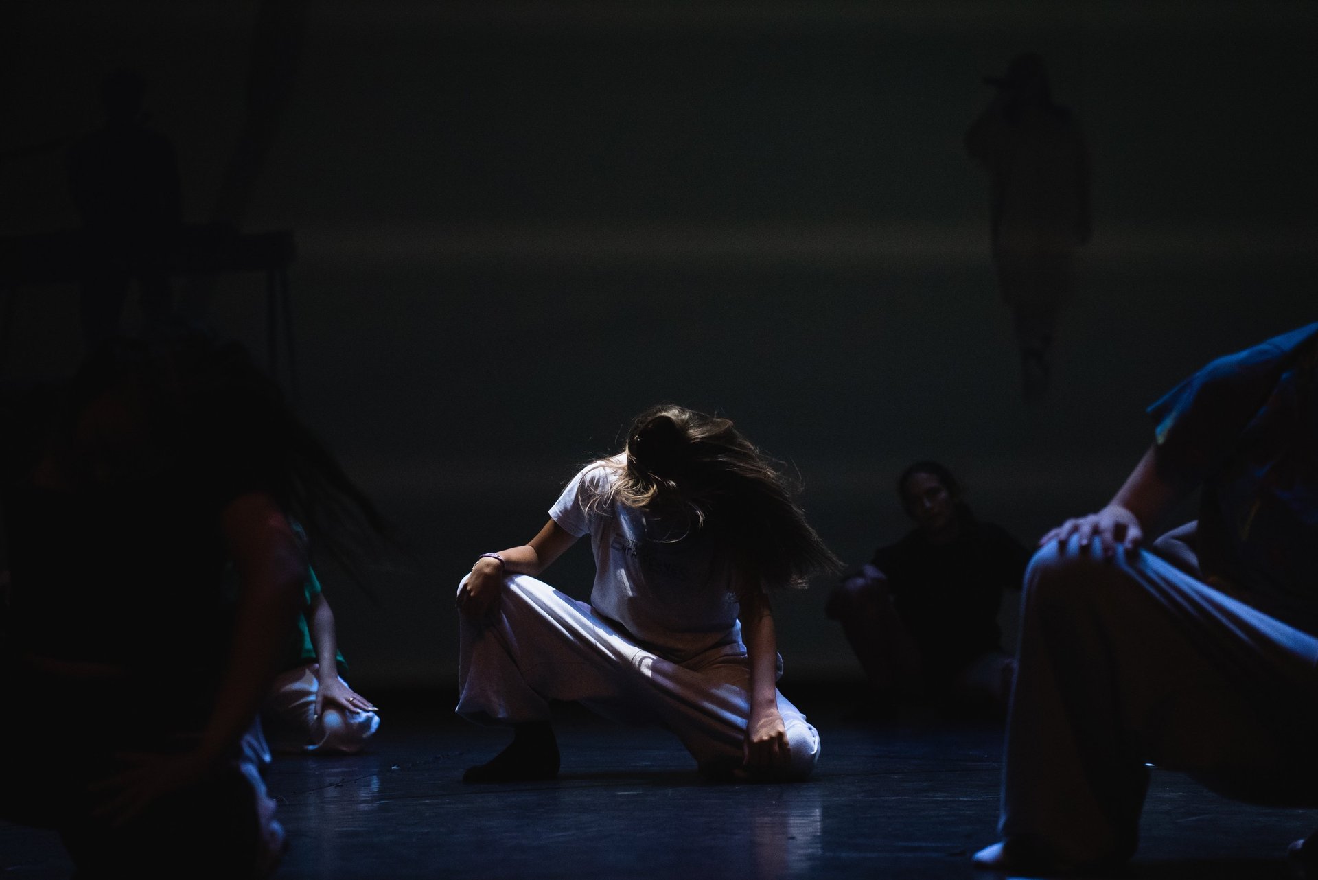 an abstract photo of a curved building with a blue sky in the background