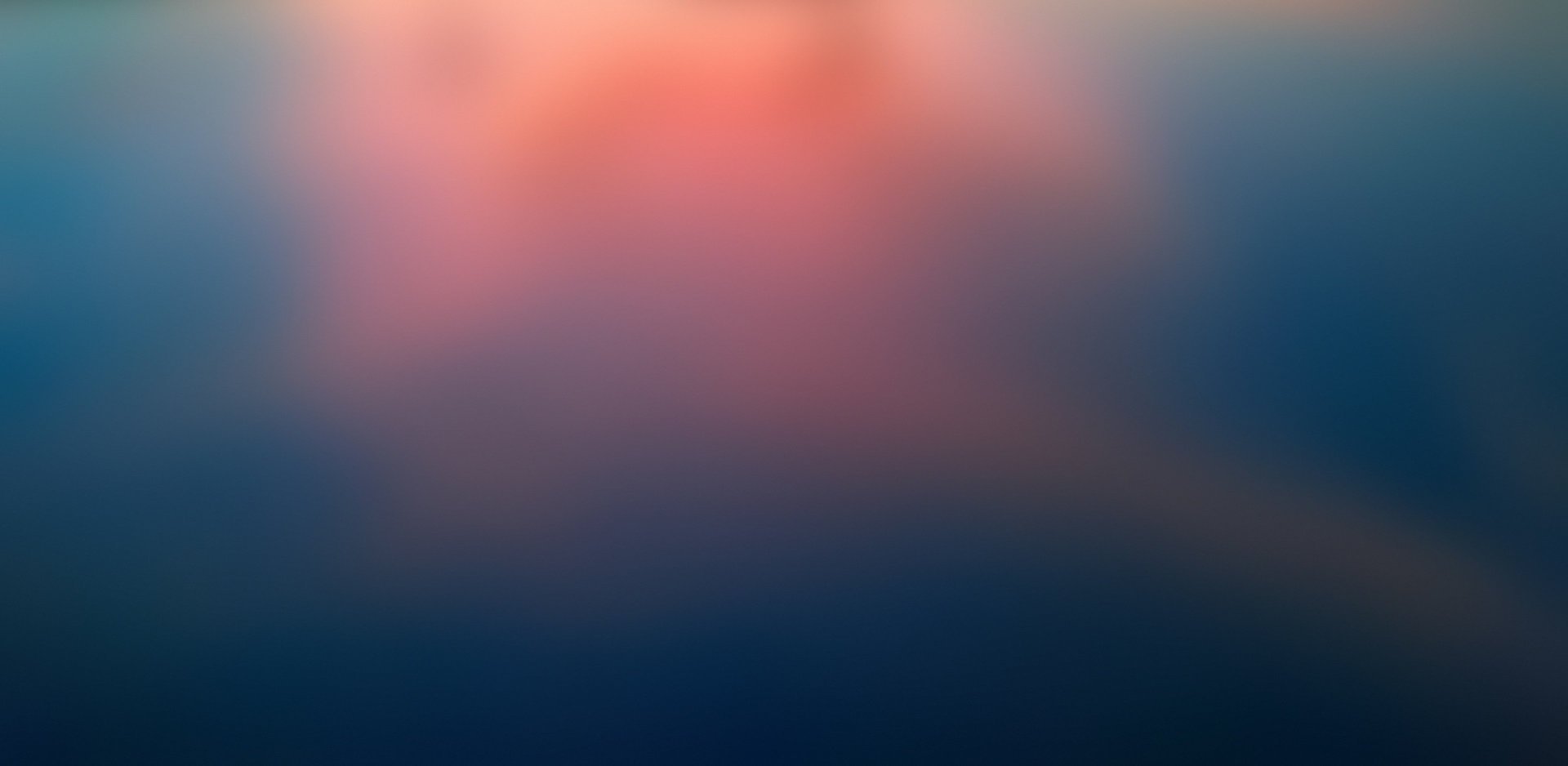 a multicolored tile wall with a pattern of small squares