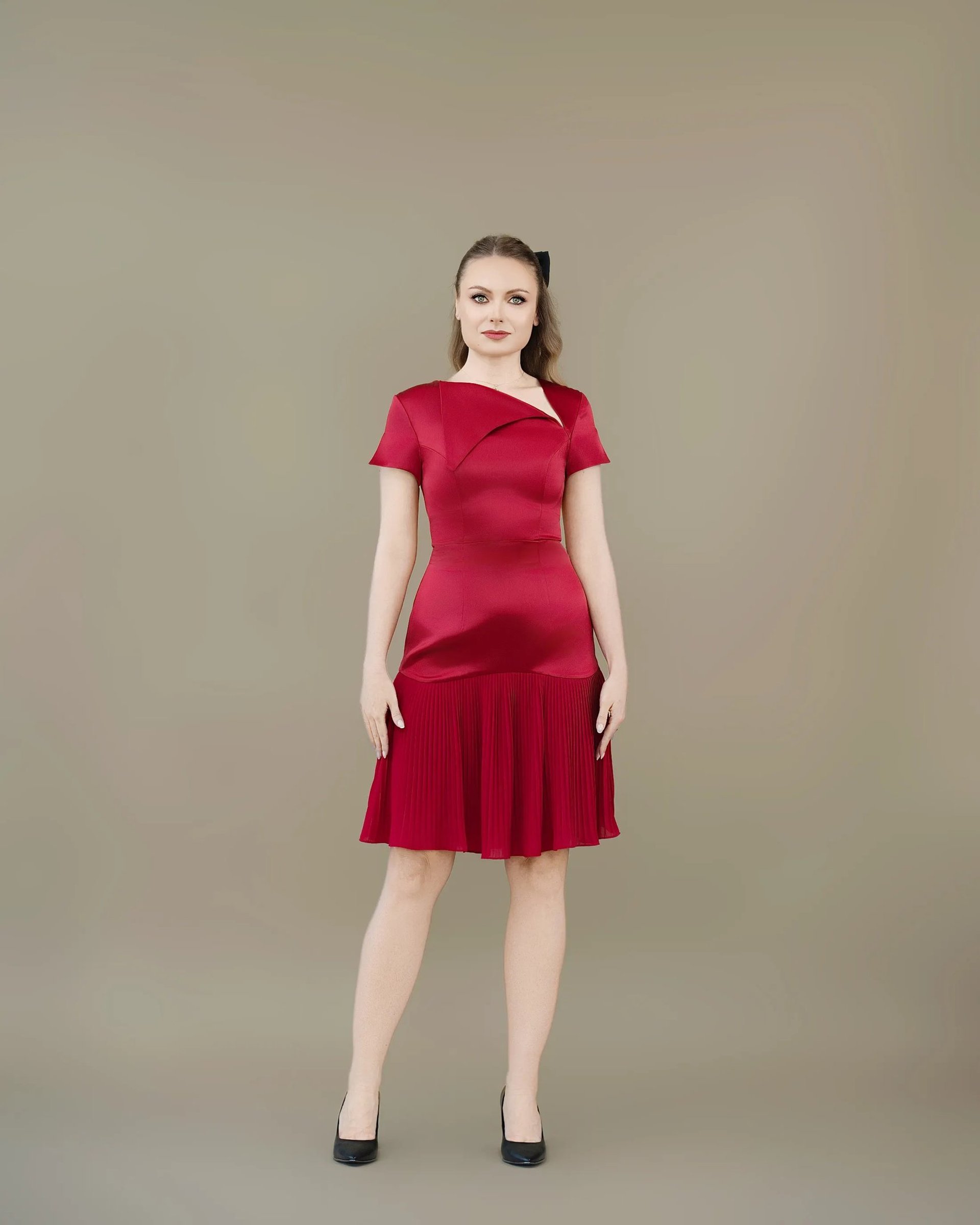 an abstract photo of a curved building with a blue sky in the background
