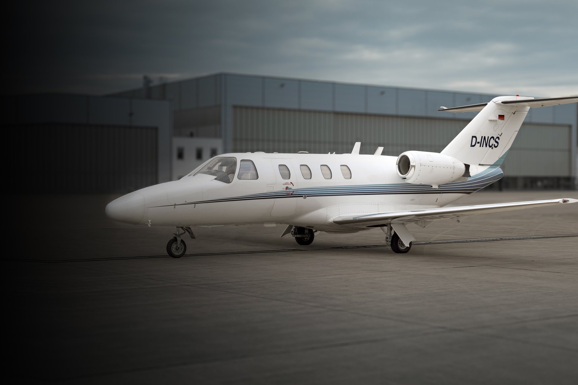 Hawker 800XP cabin interior with luxury leather seating and ambient lighting