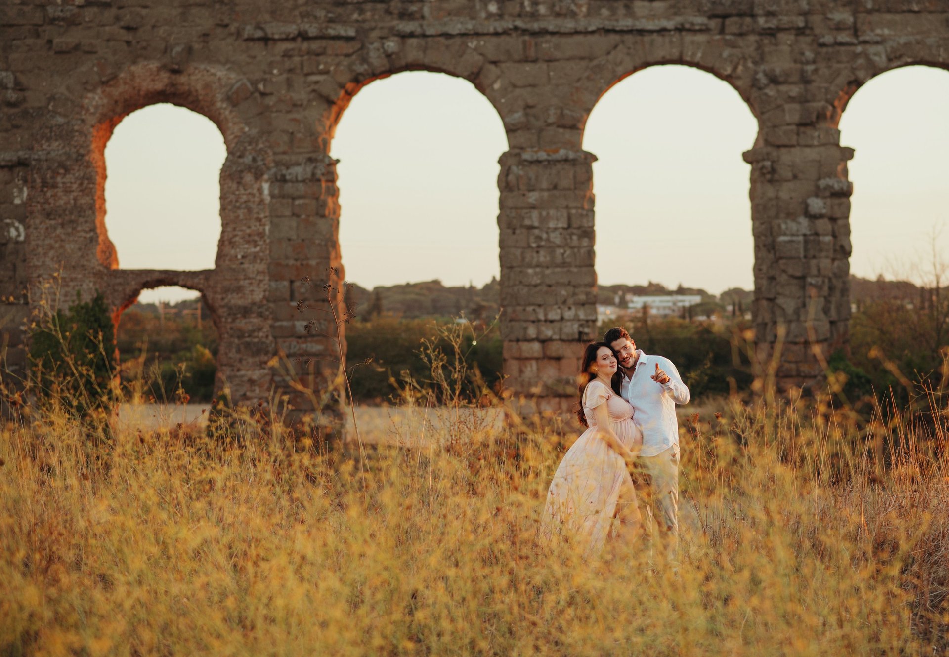 an abstract photo of a curved building with a blue sky in the background
