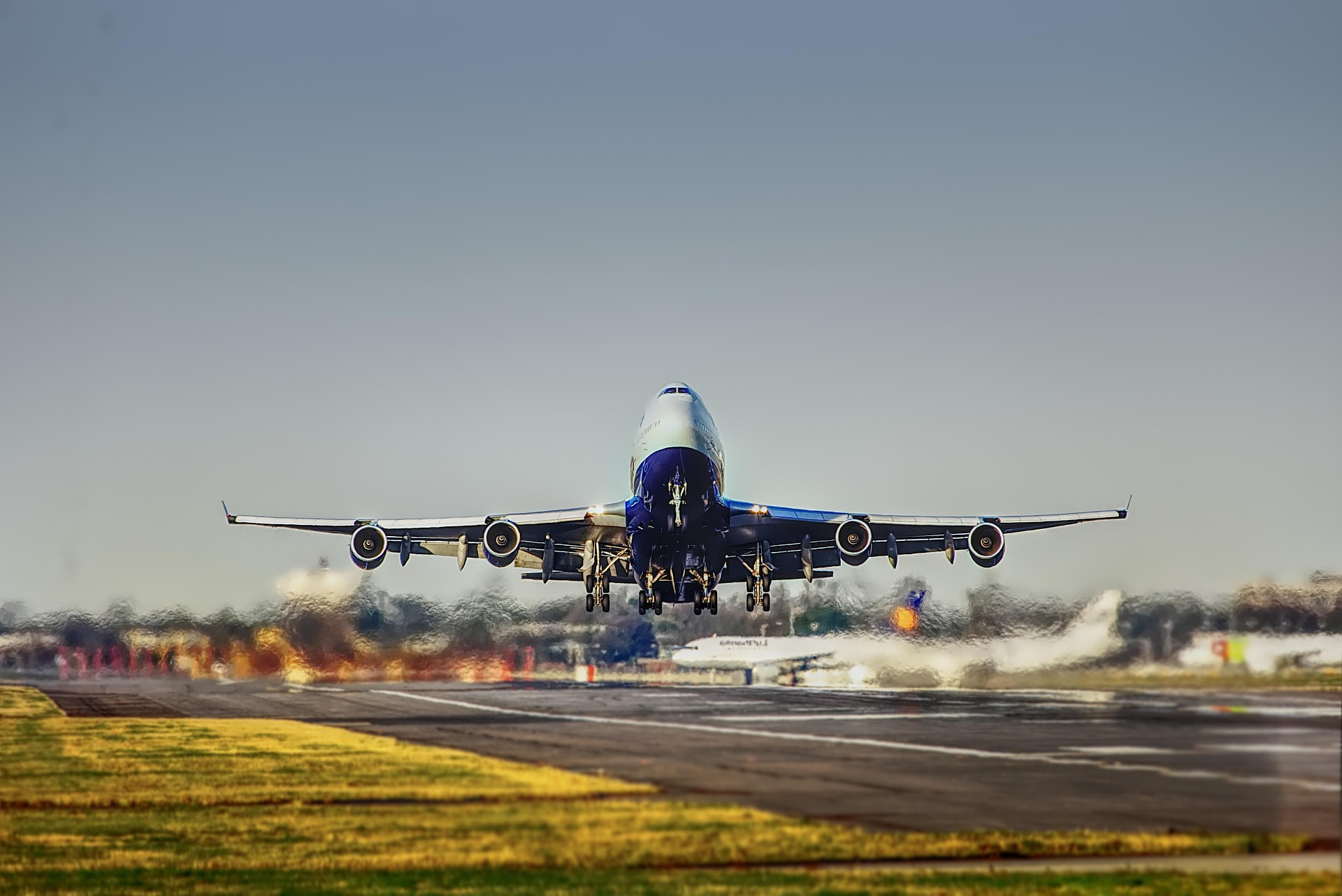 black and brown leather padded tub sofa