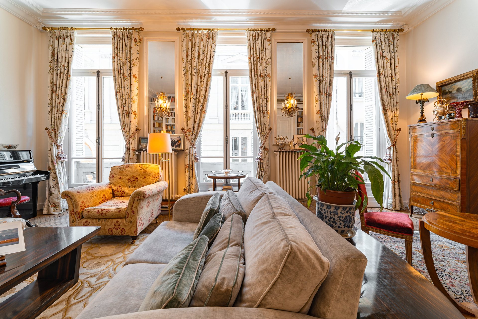 white concrete house near green tree during daytime