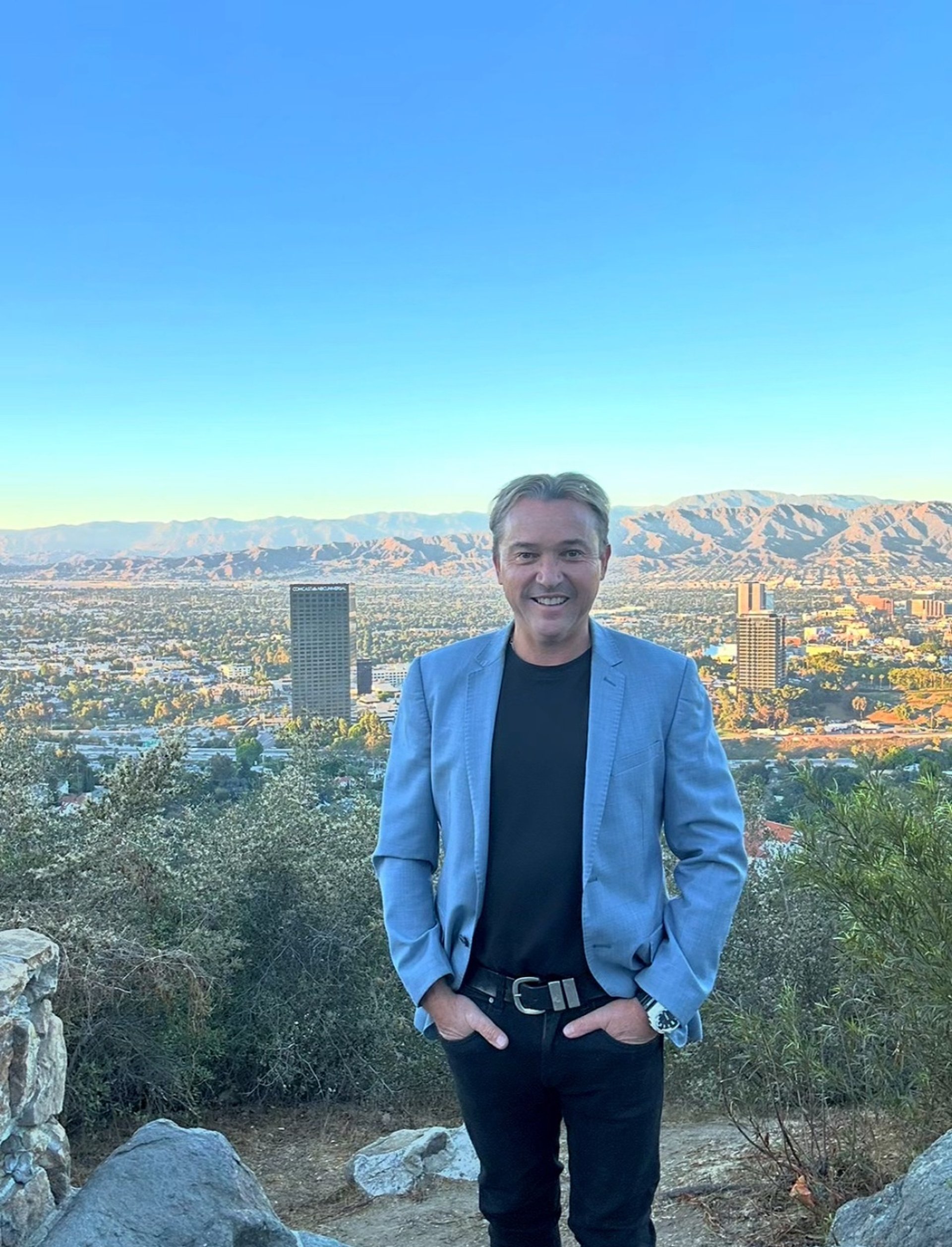 black and brown leather padded tub sofa
