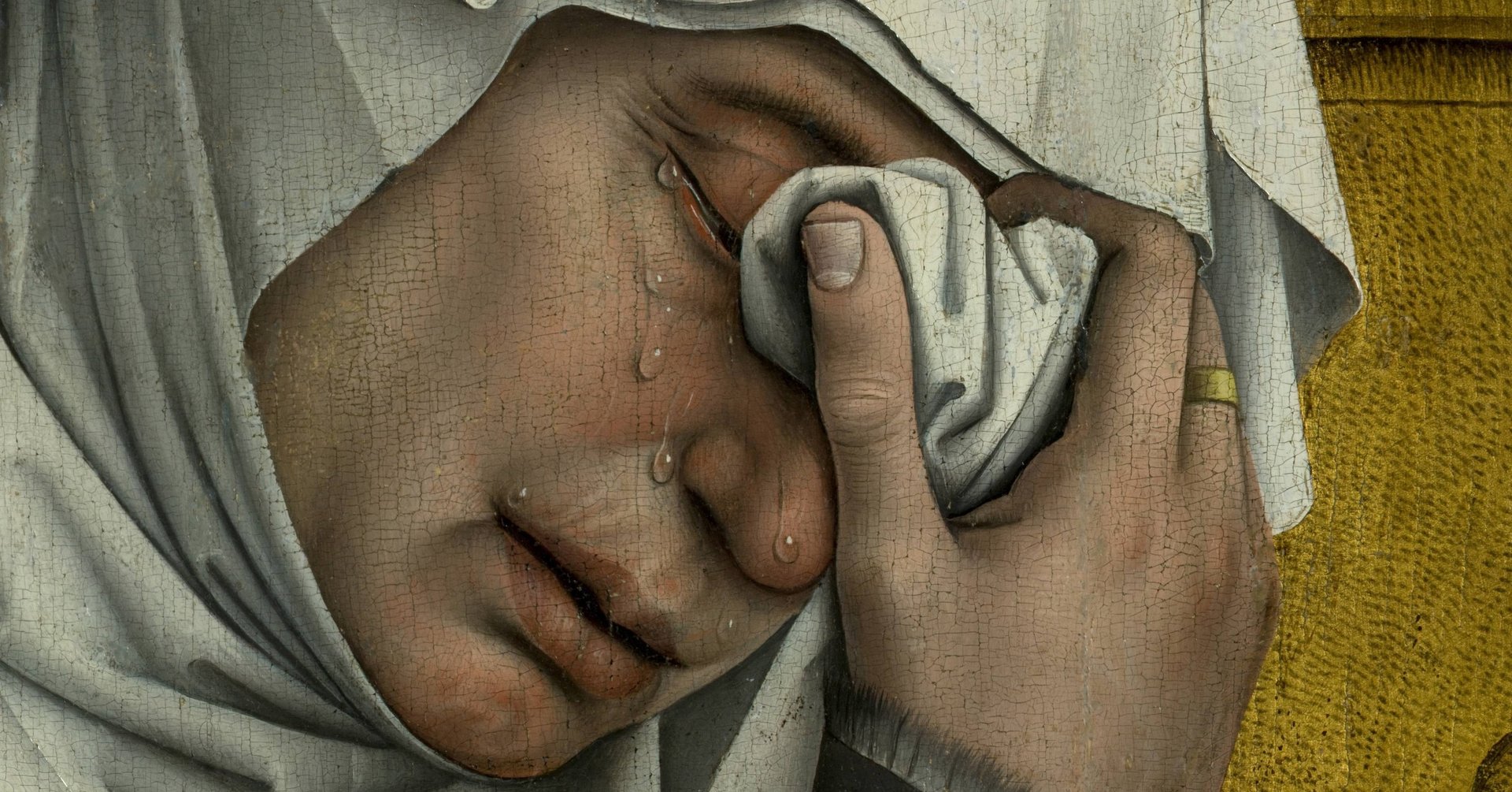a person holding a handful of coins in their hands