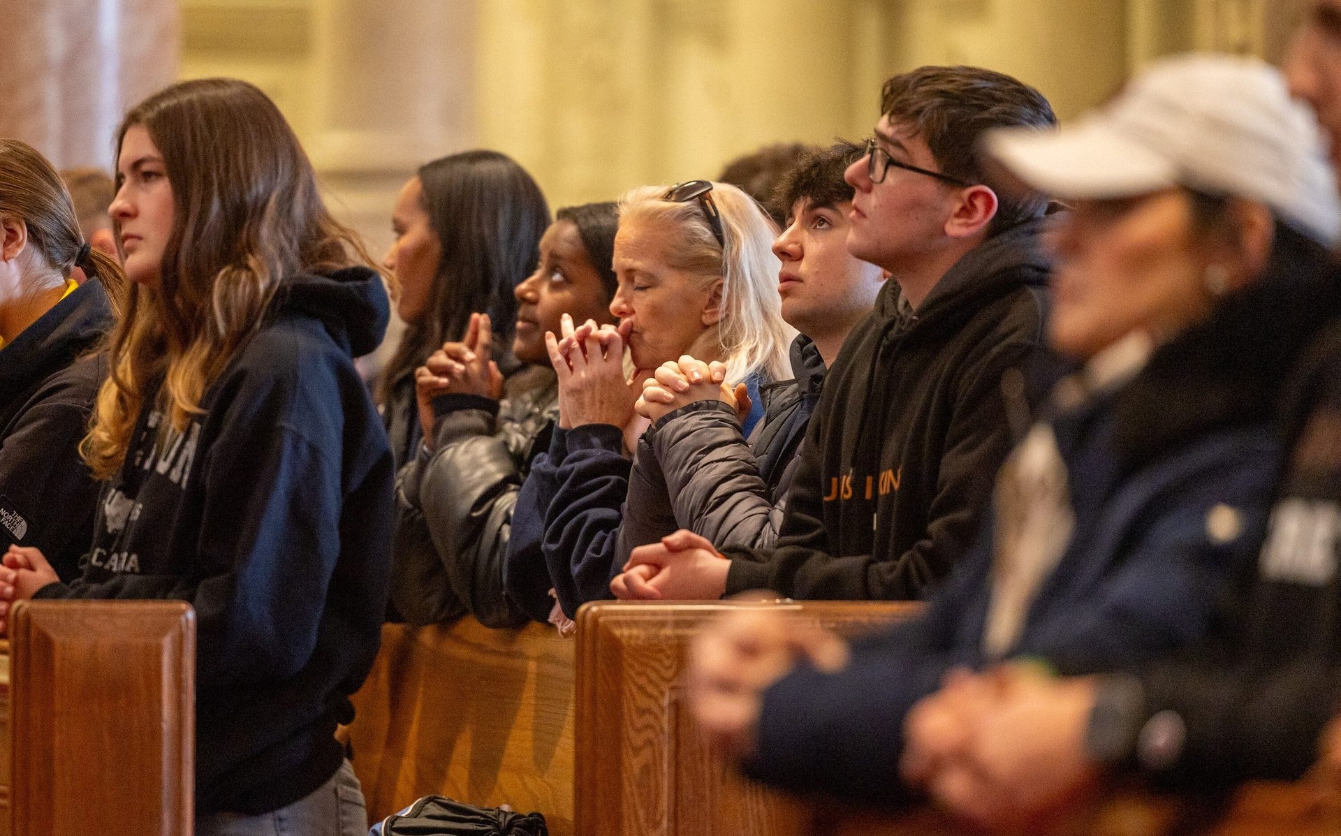a man standing in front of a church alter