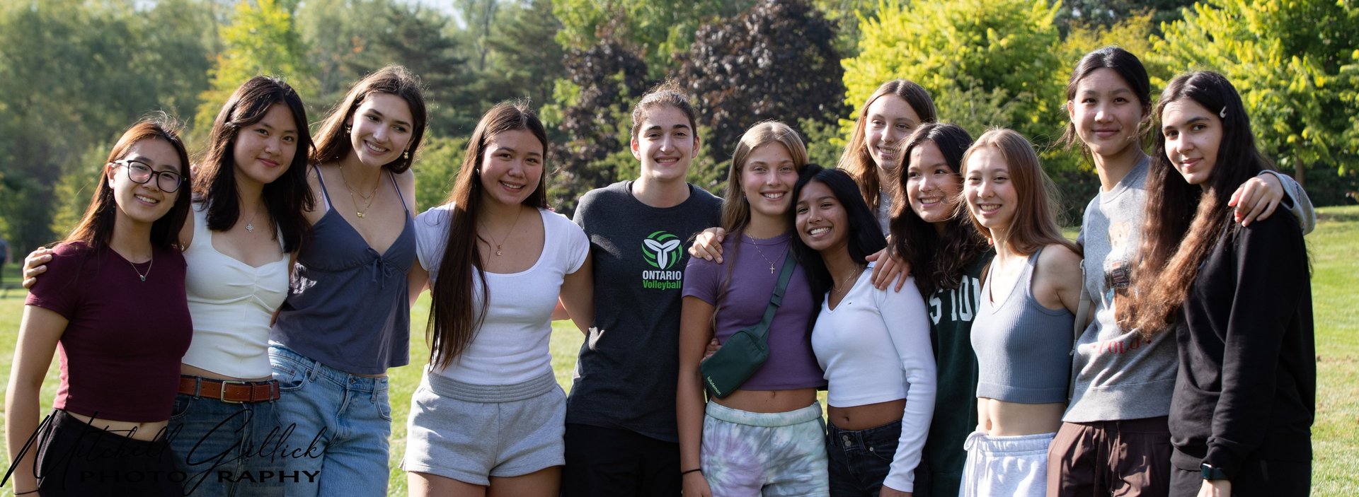 Photoshoot of 17U REACH Harmony volleyball team members