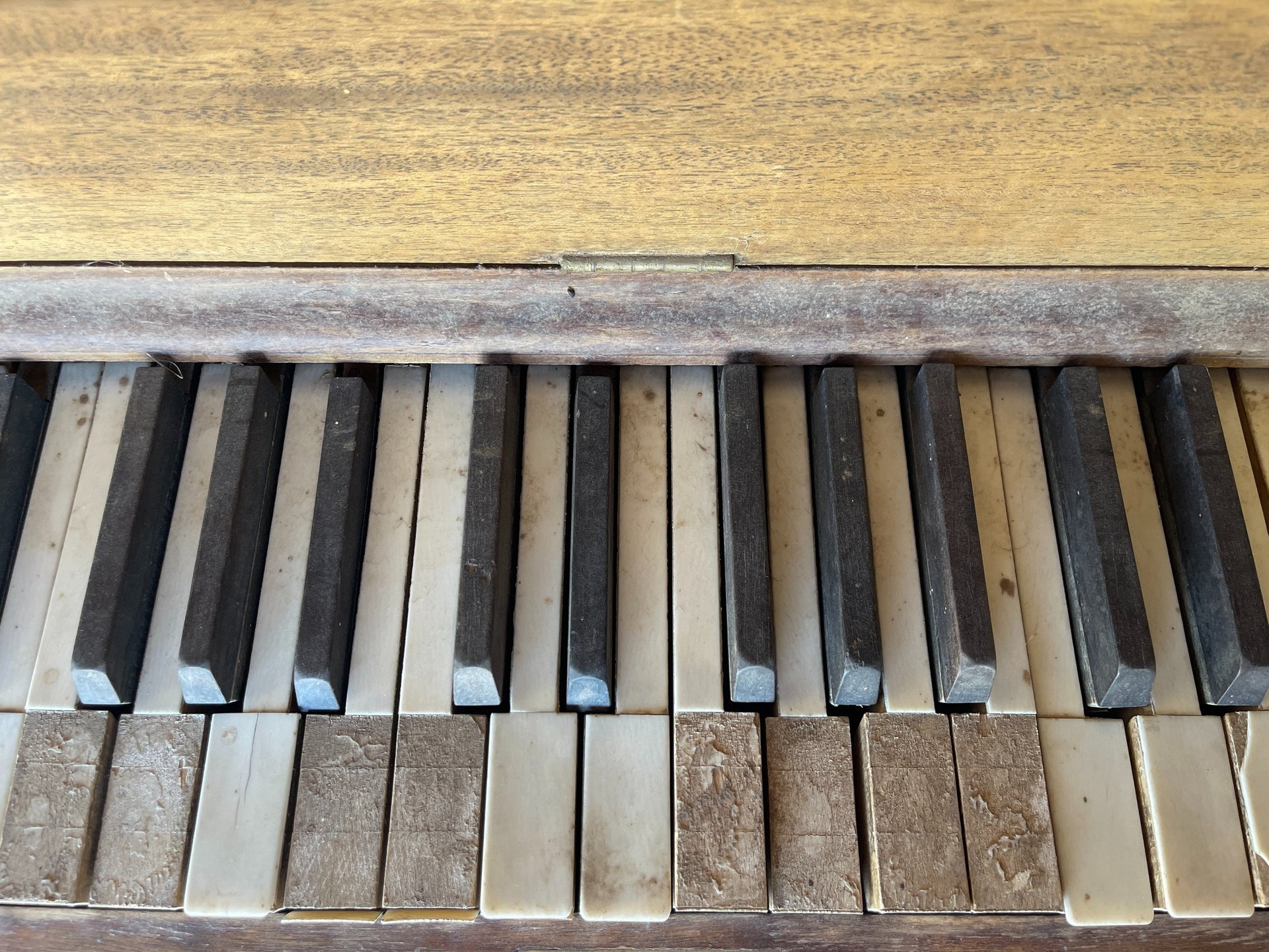 Old piano with missing keys