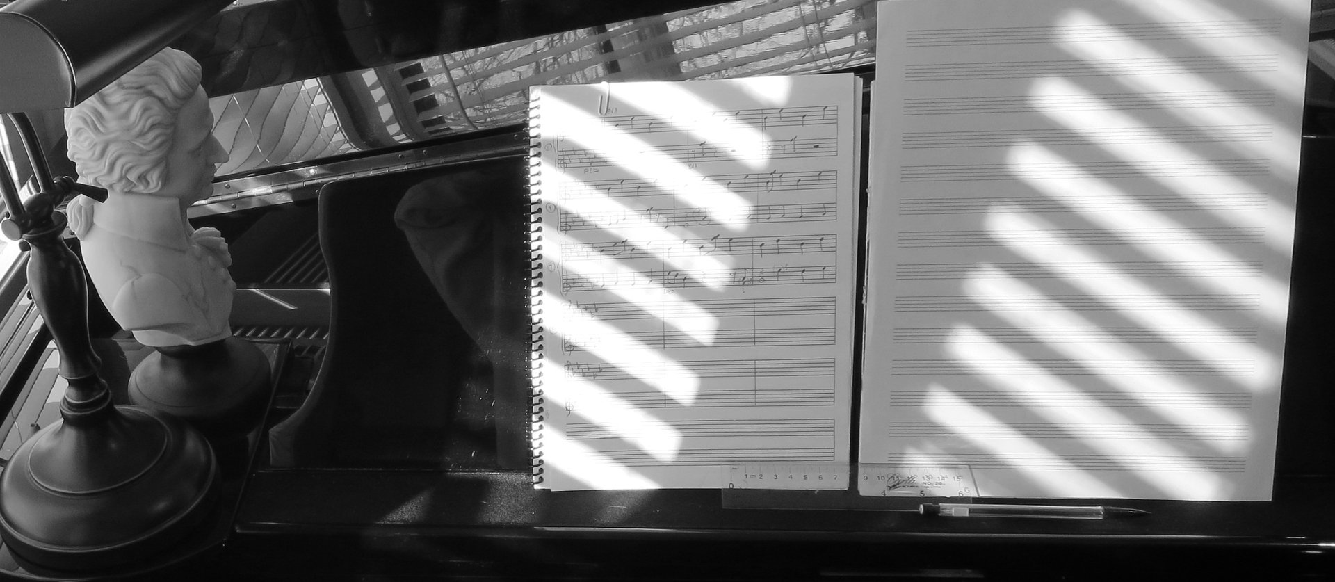 Sheet music by Jen Smith Lanthier on a grand piano