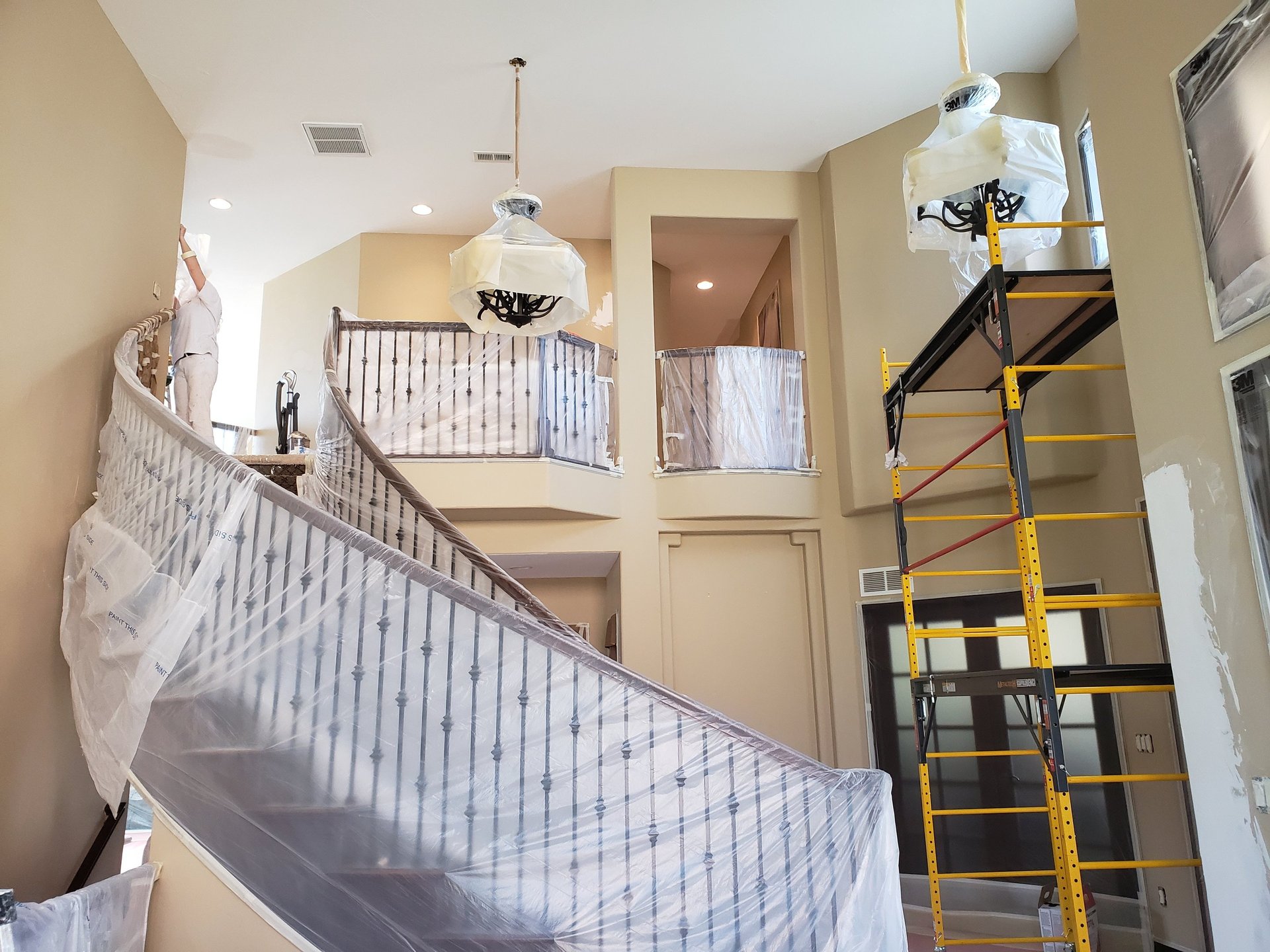 an abstract photo of a curved building with a blue sky in the background