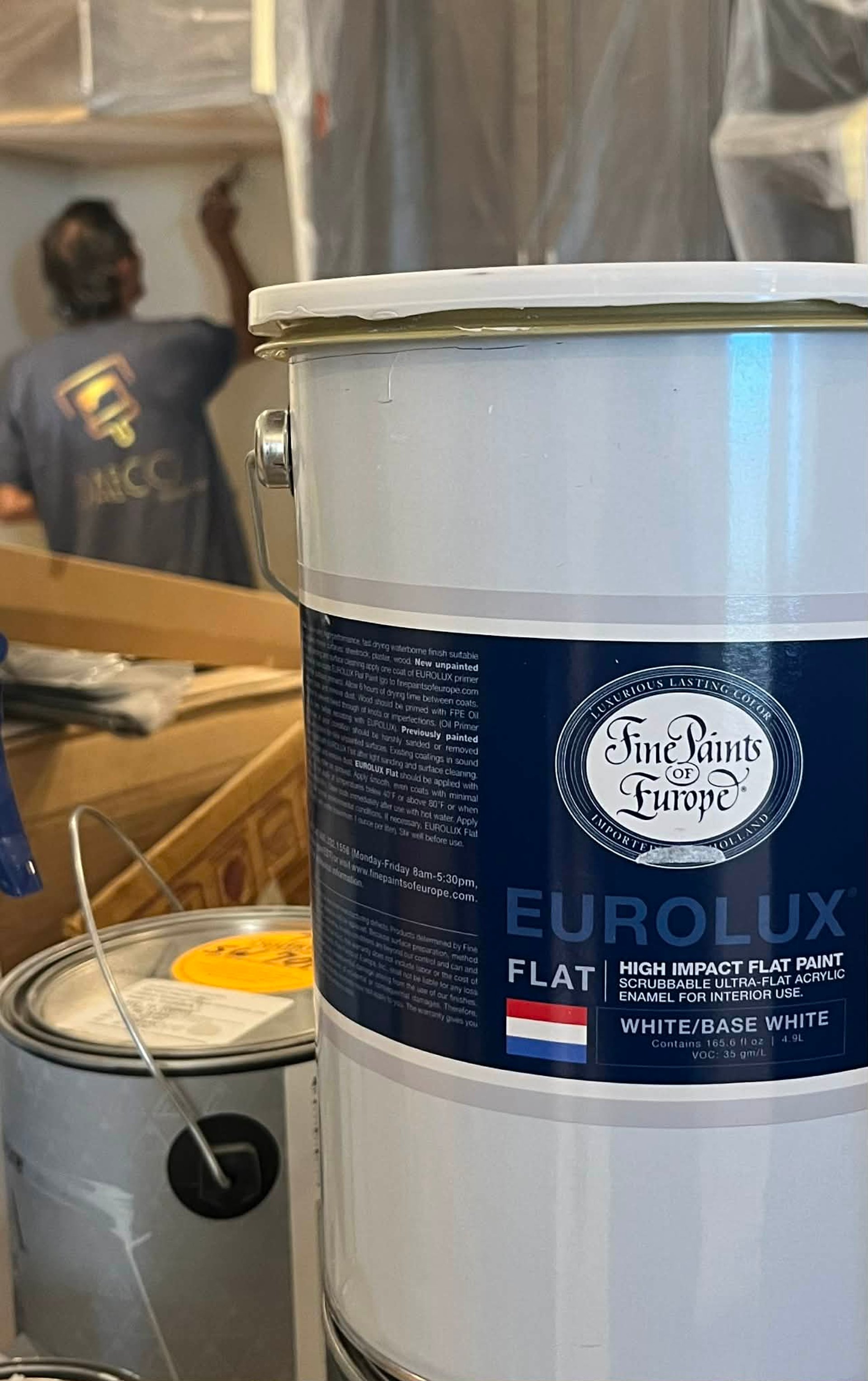 an abstract photo of a curved building with a blue sky in the background