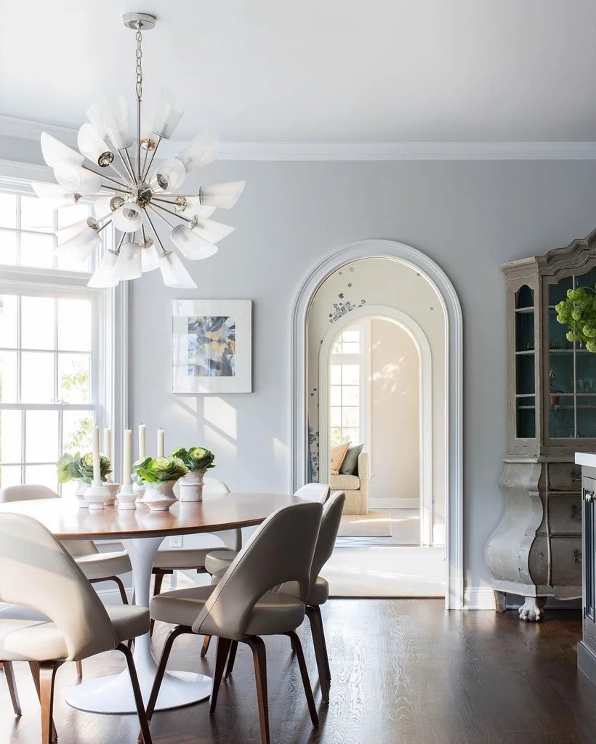 an abstract photo of a curved building with a blue sky in the background