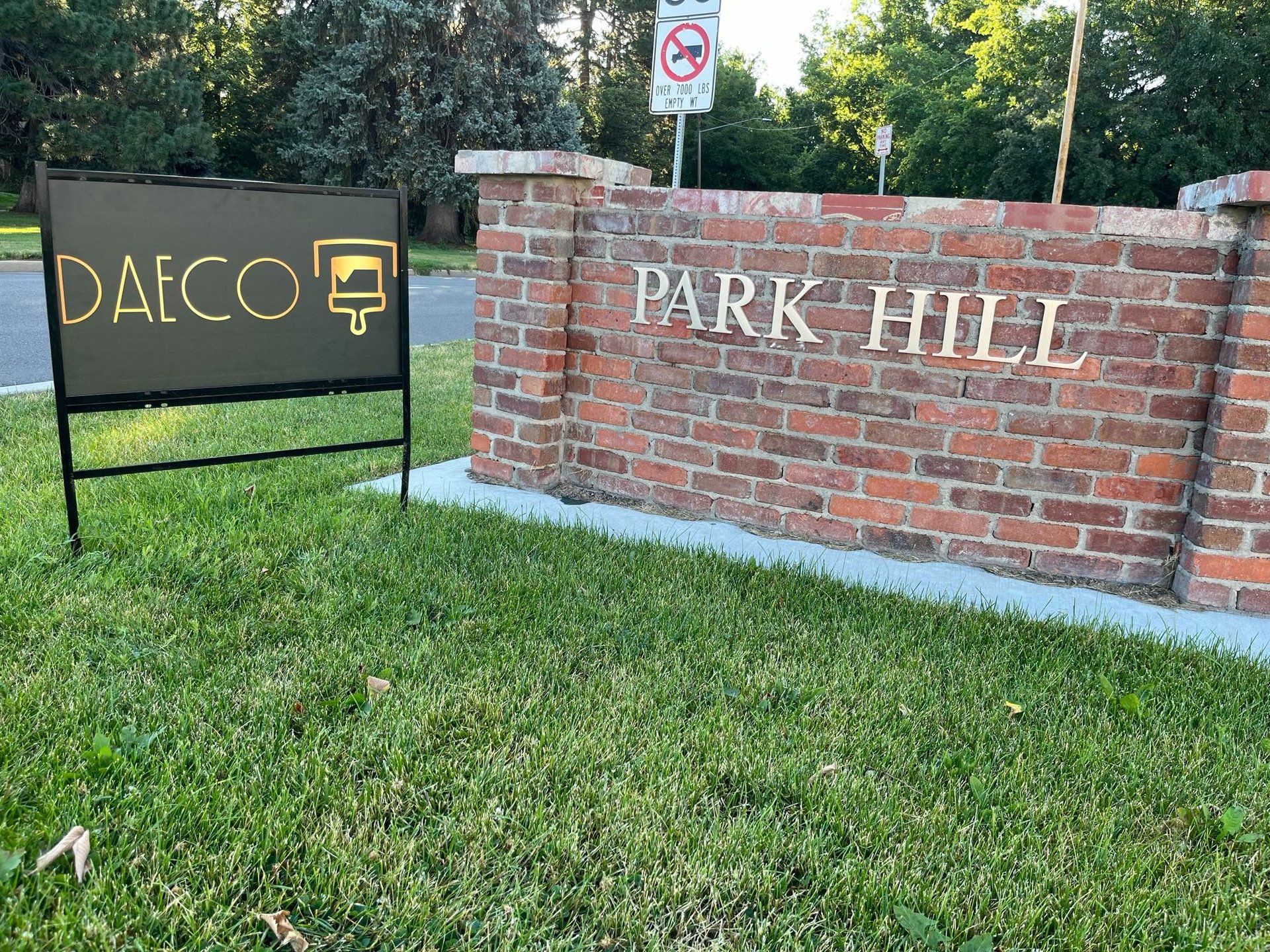an abstract photo of a curved building with a blue sky in the background