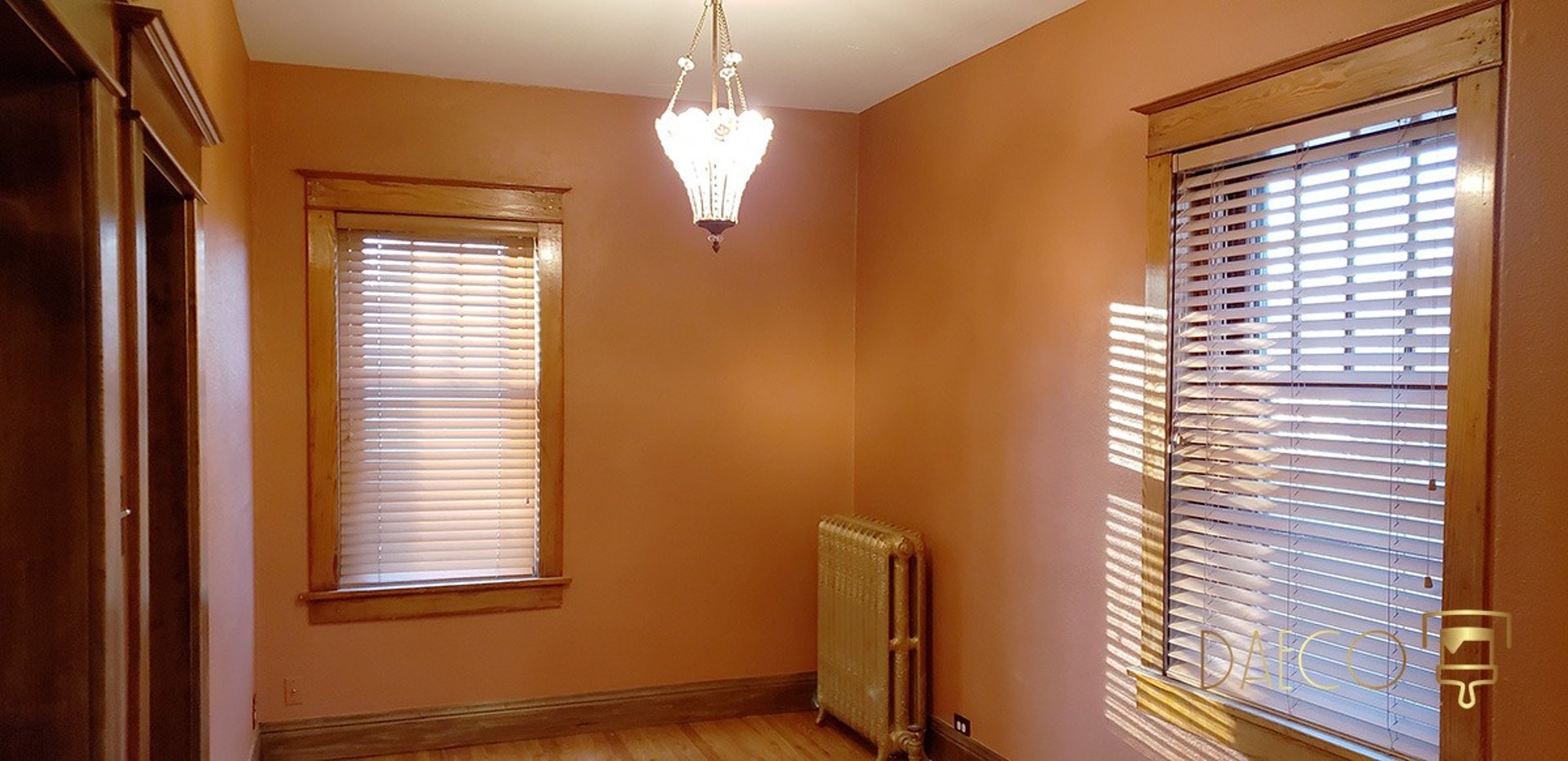 an abstract photo of a curved building with a blue sky in the background