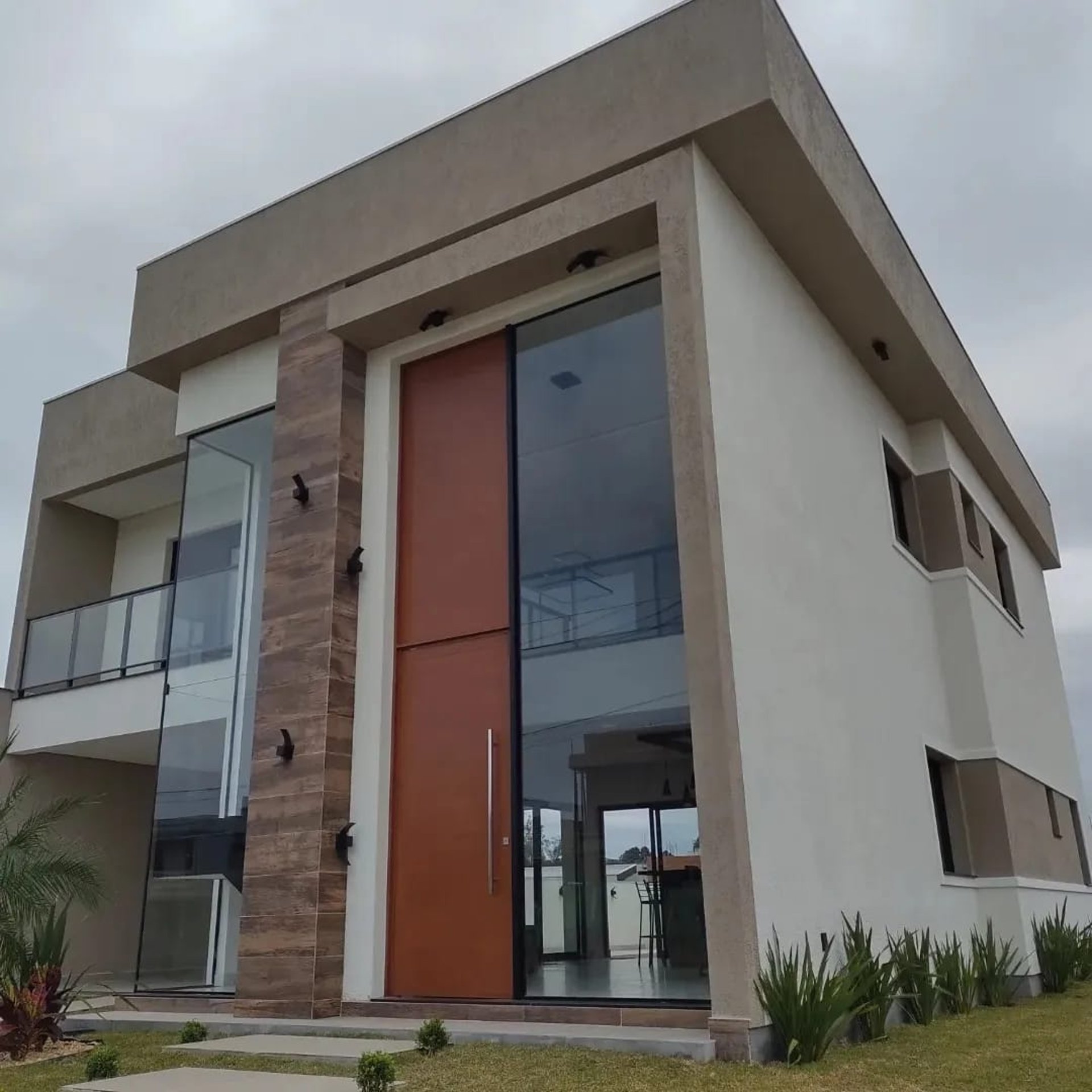 black and brown leather padded tub sofa