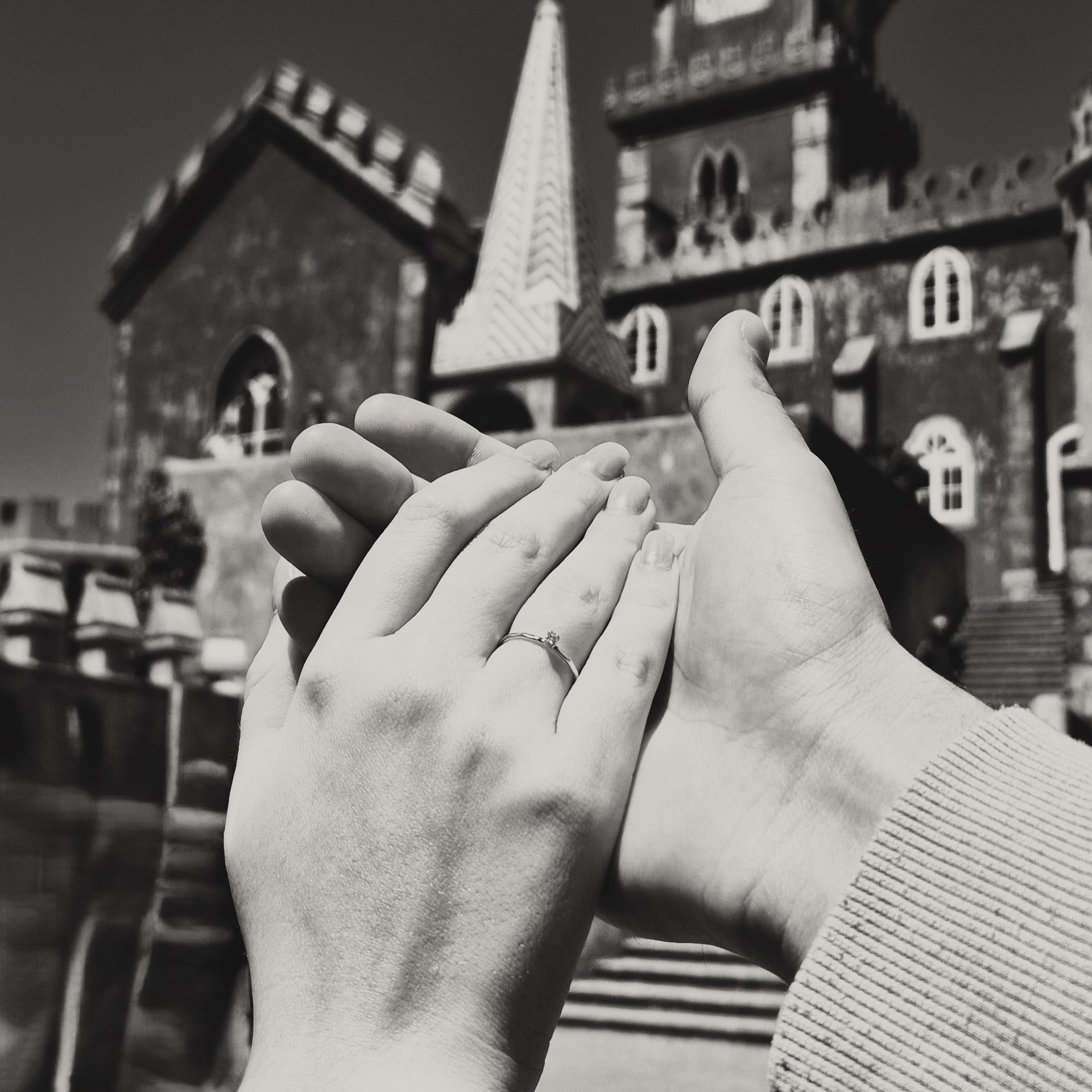 a man and a woman sitting next to each other