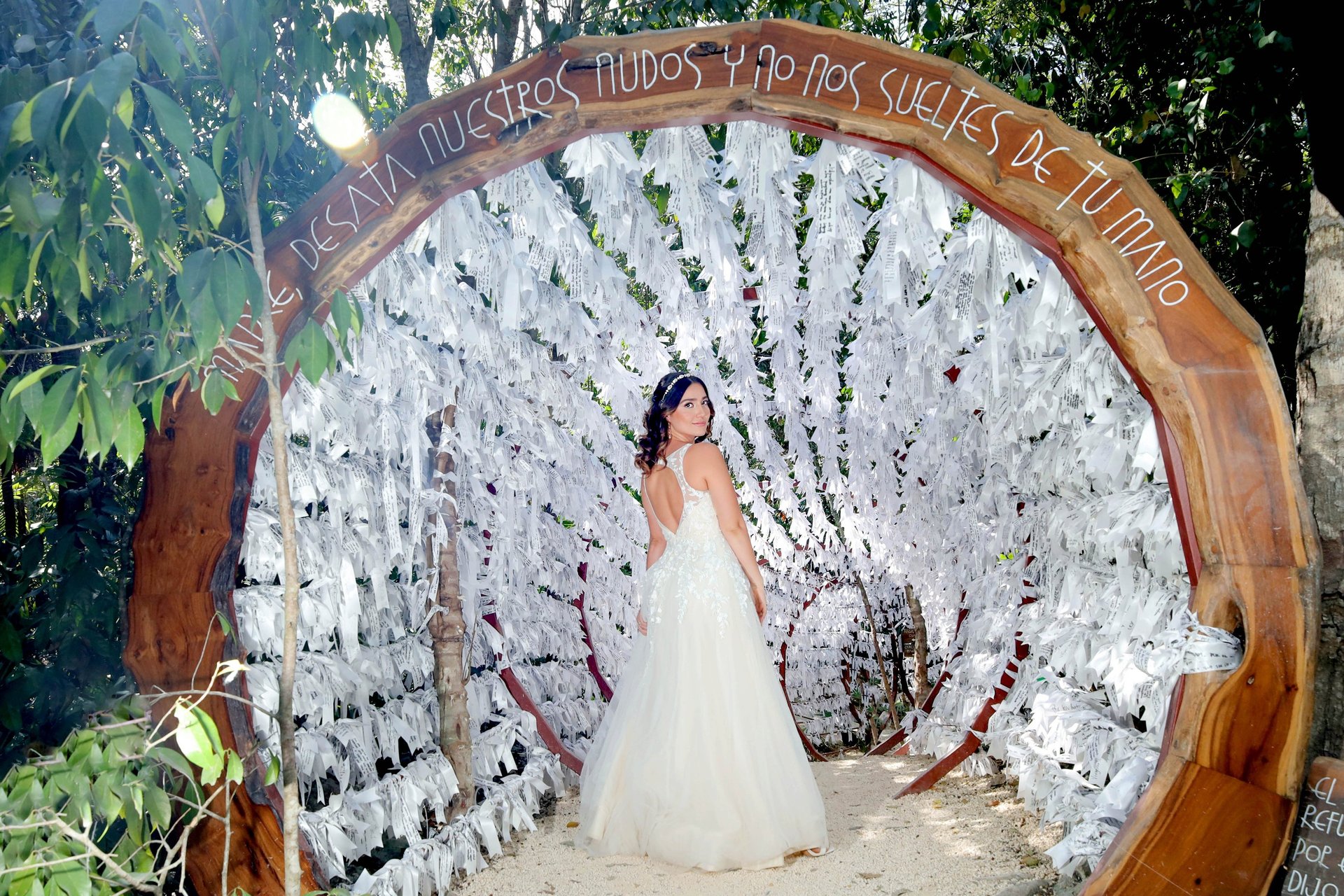 A woman holding a bouquet of white flowers