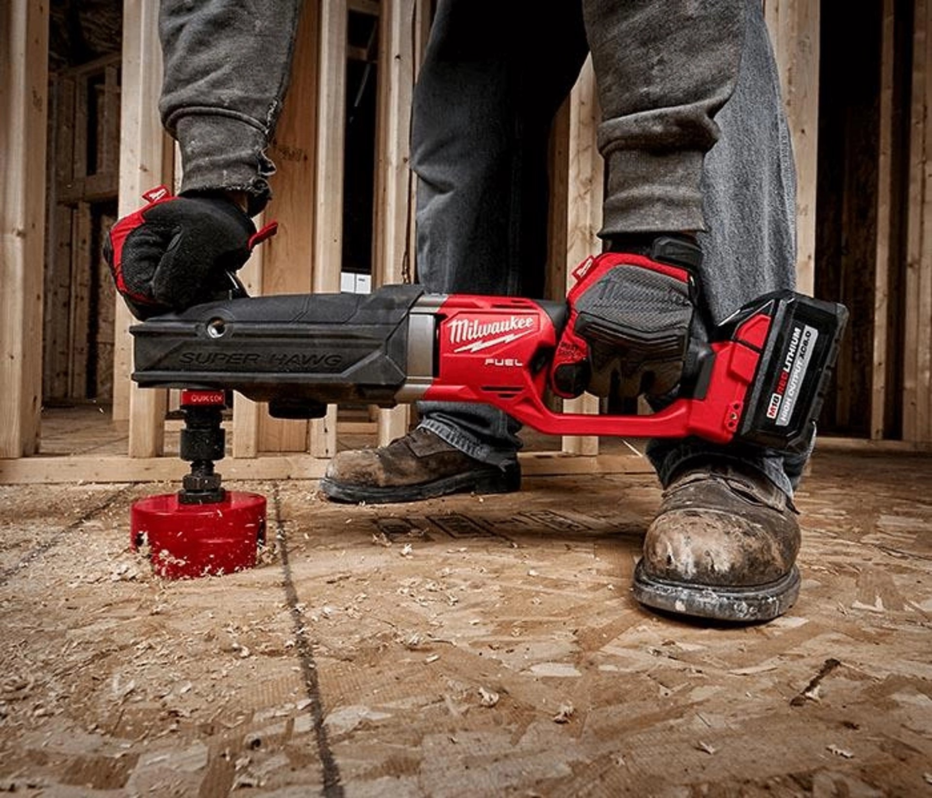 a group of red and black tools on a white surface