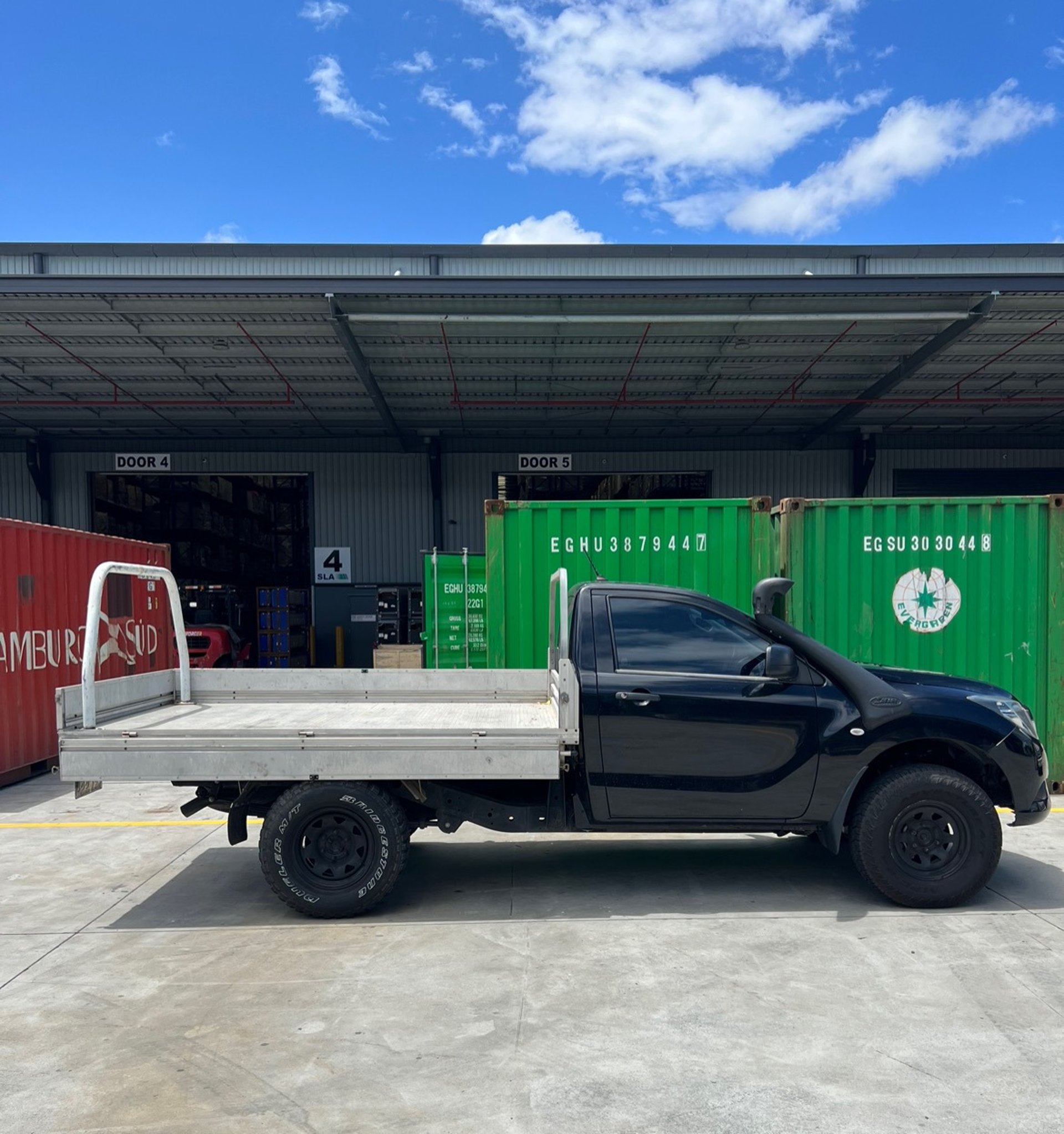 black and brown leather padded tub sofa