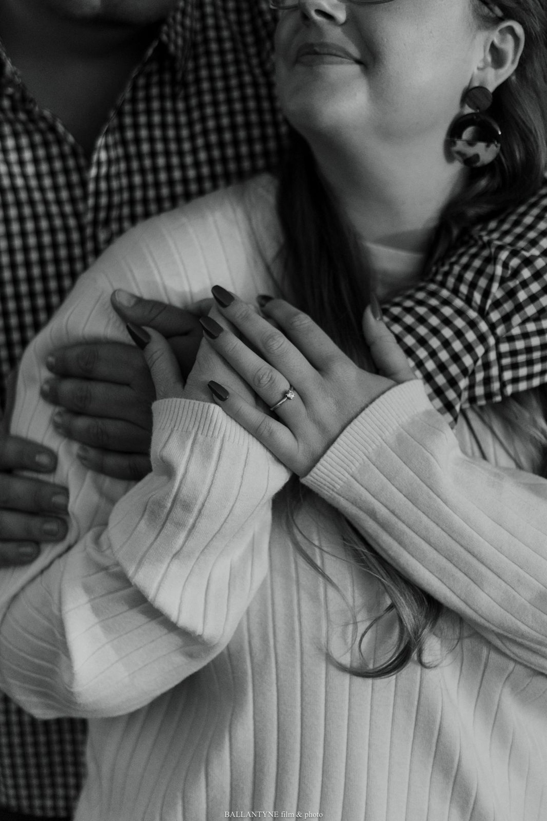 couple wearing silver-colored rings