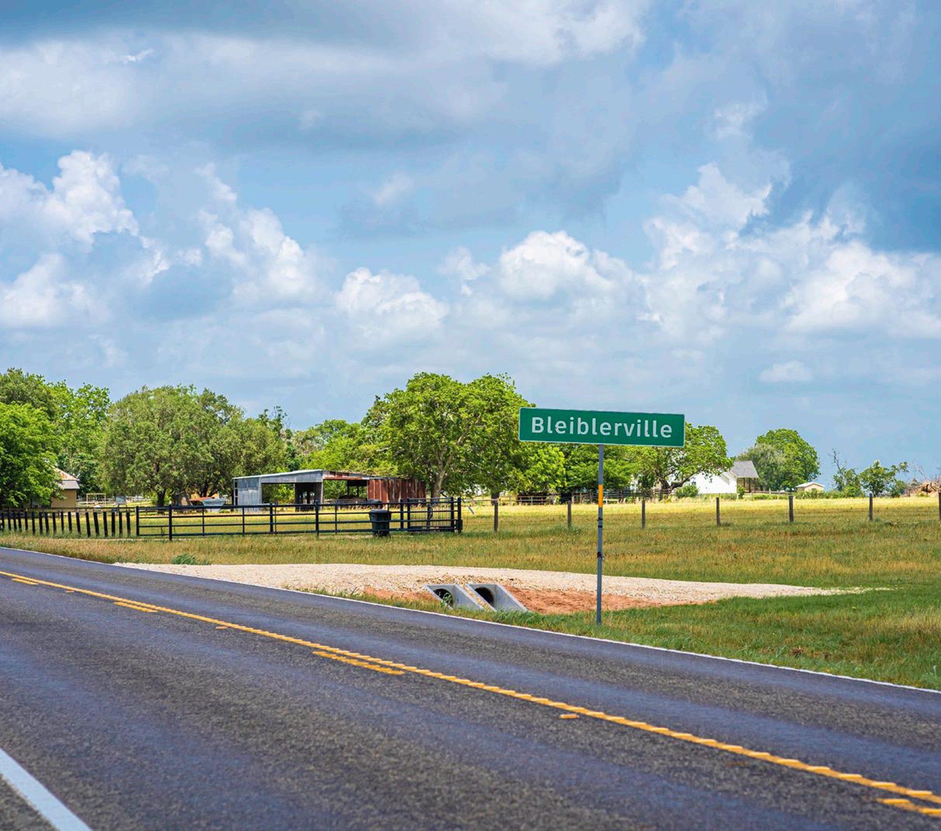 black and brown leather padded tub sofa