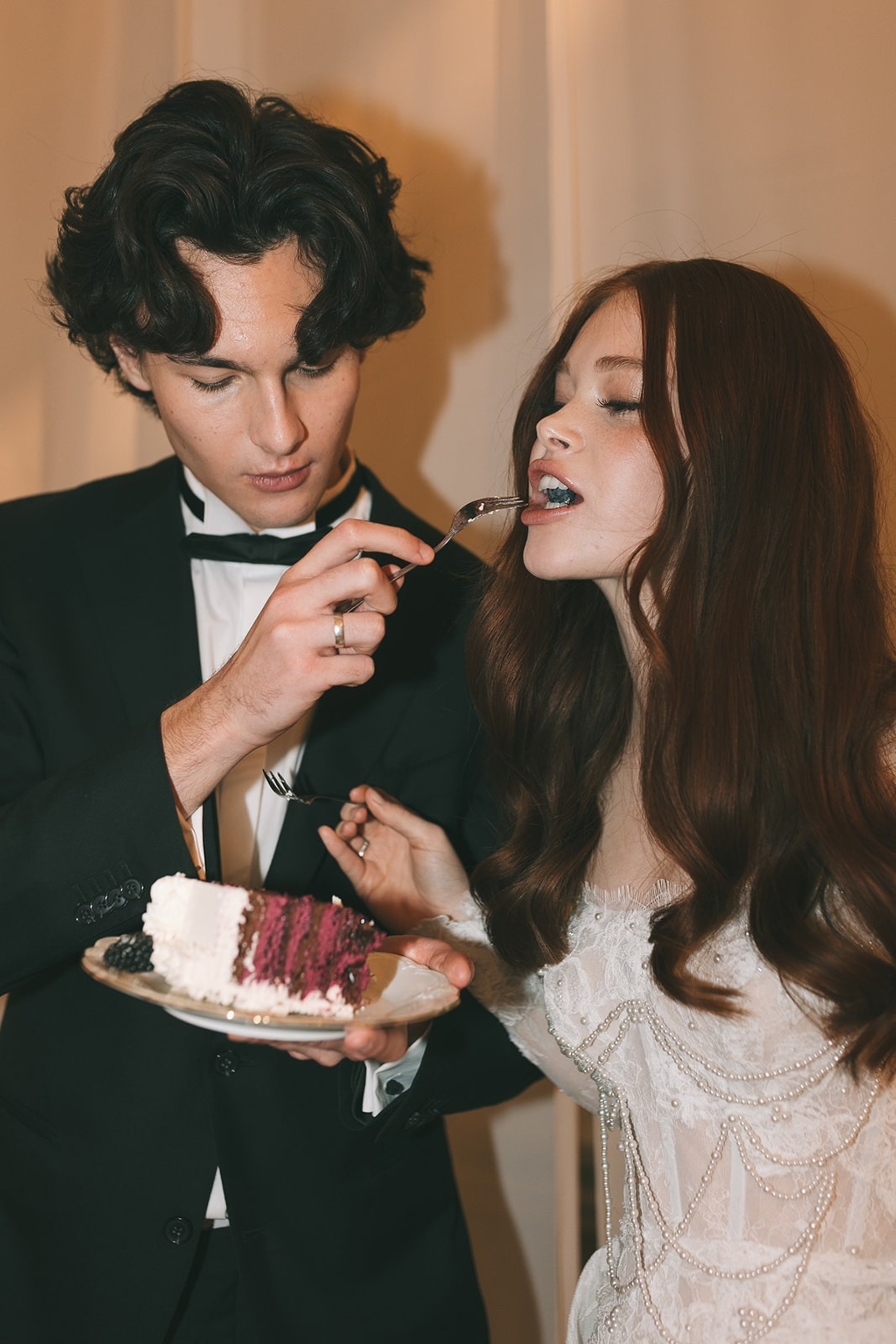 an abstract photo of a curved building with a blue sky in the background