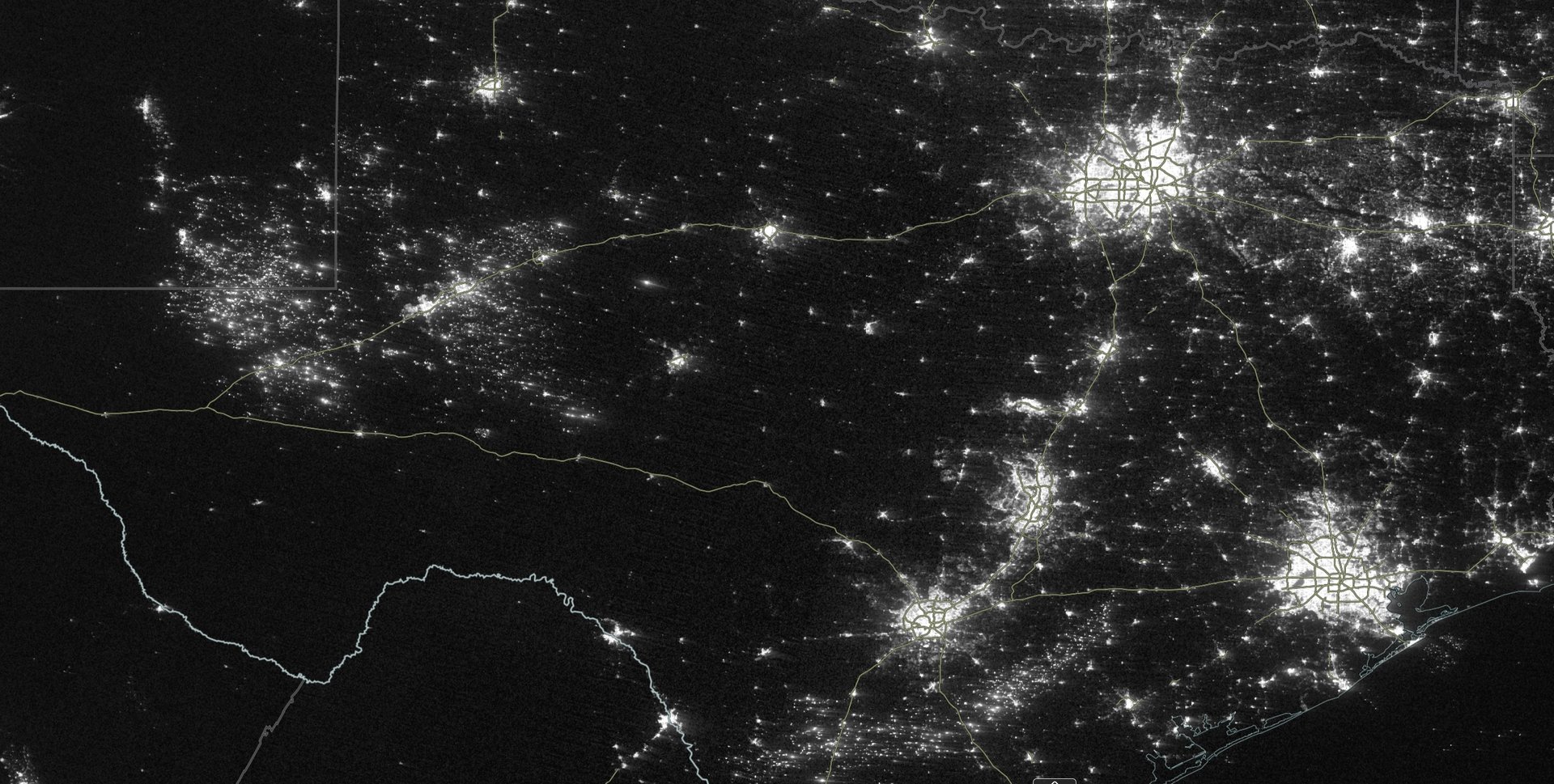green trees near city buildings under white clouds during daytime
