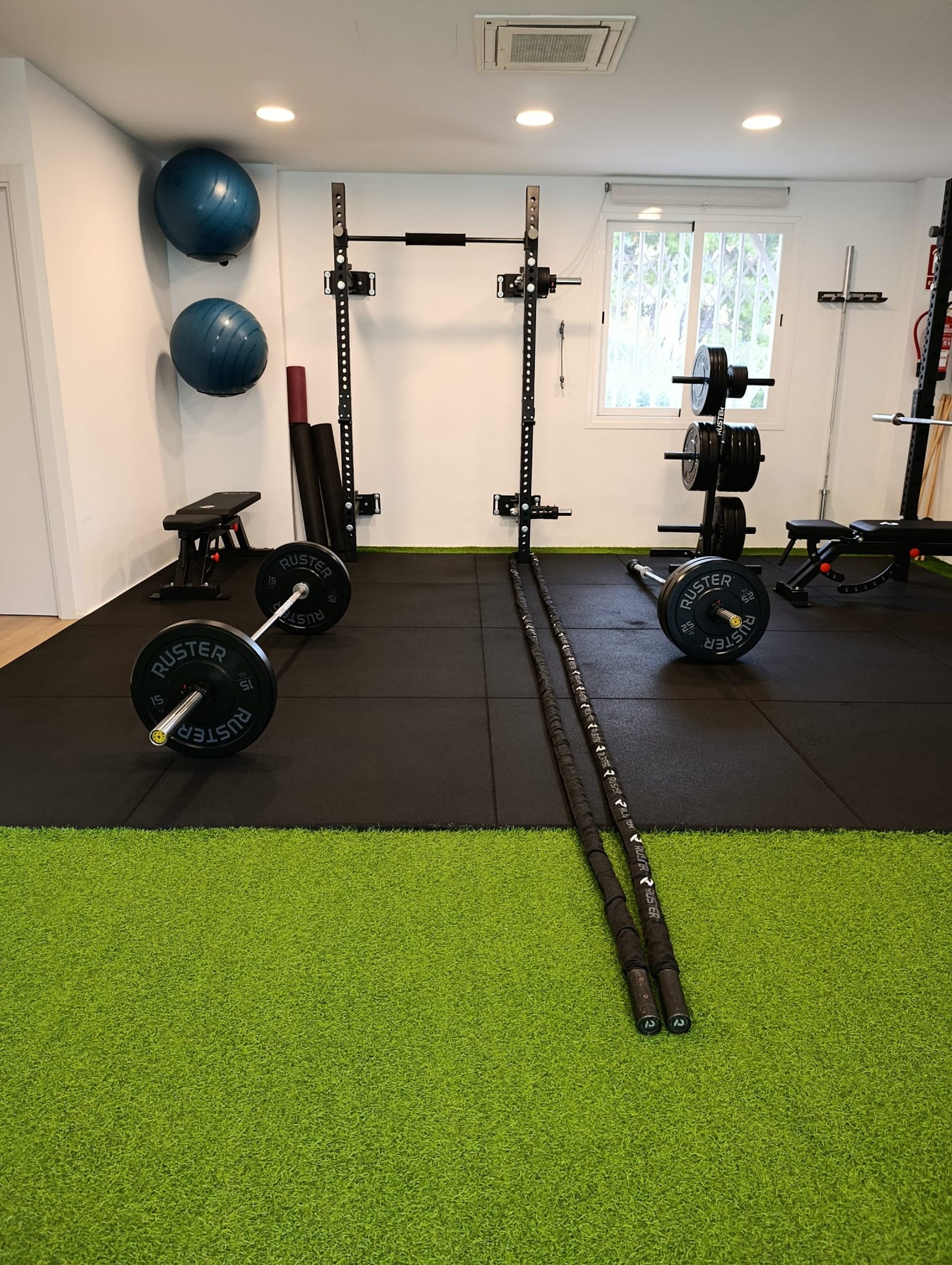 black and brown leather padded tub sofa