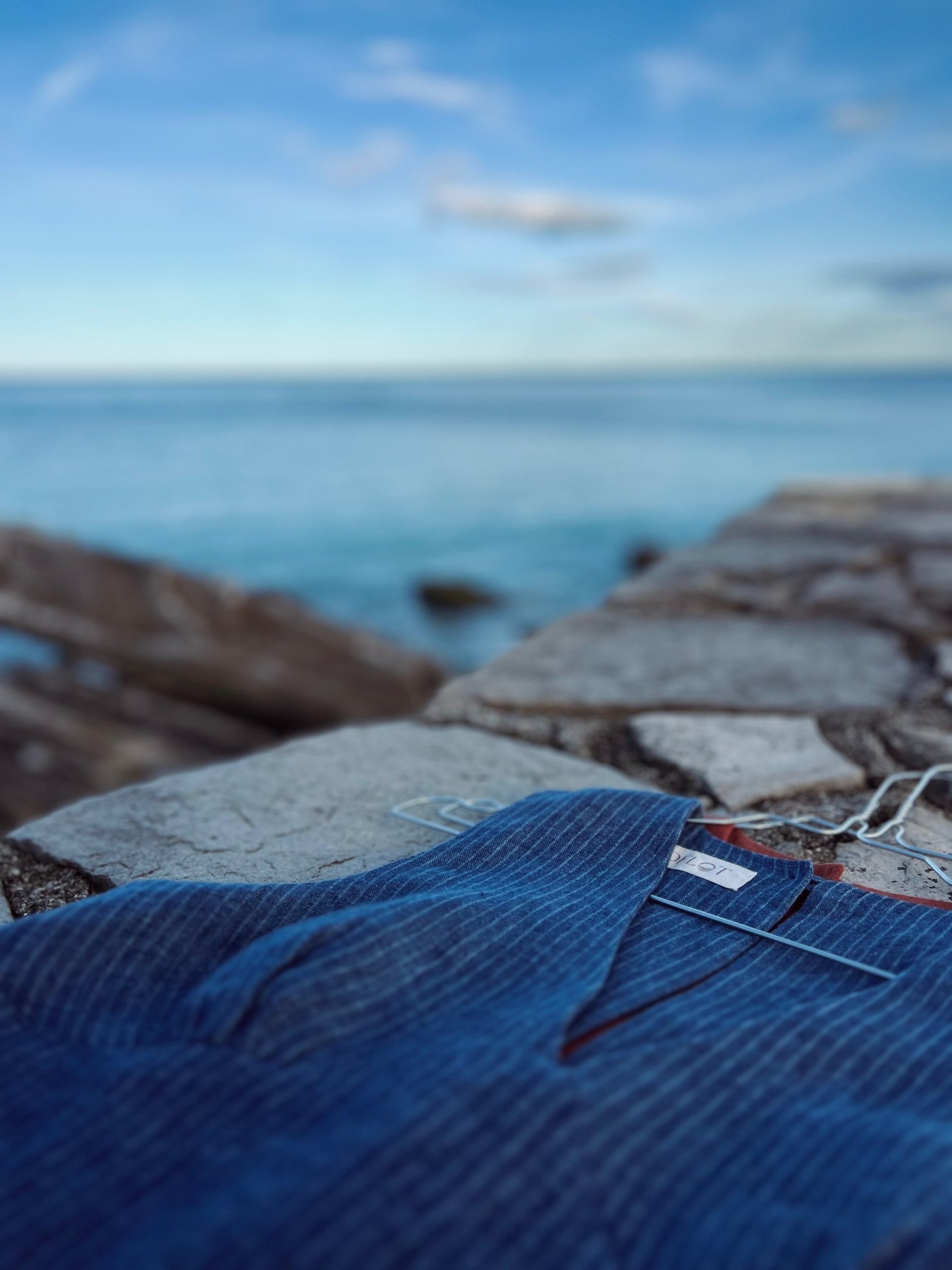 woman in white crew neck shirt wearing brown sun hat