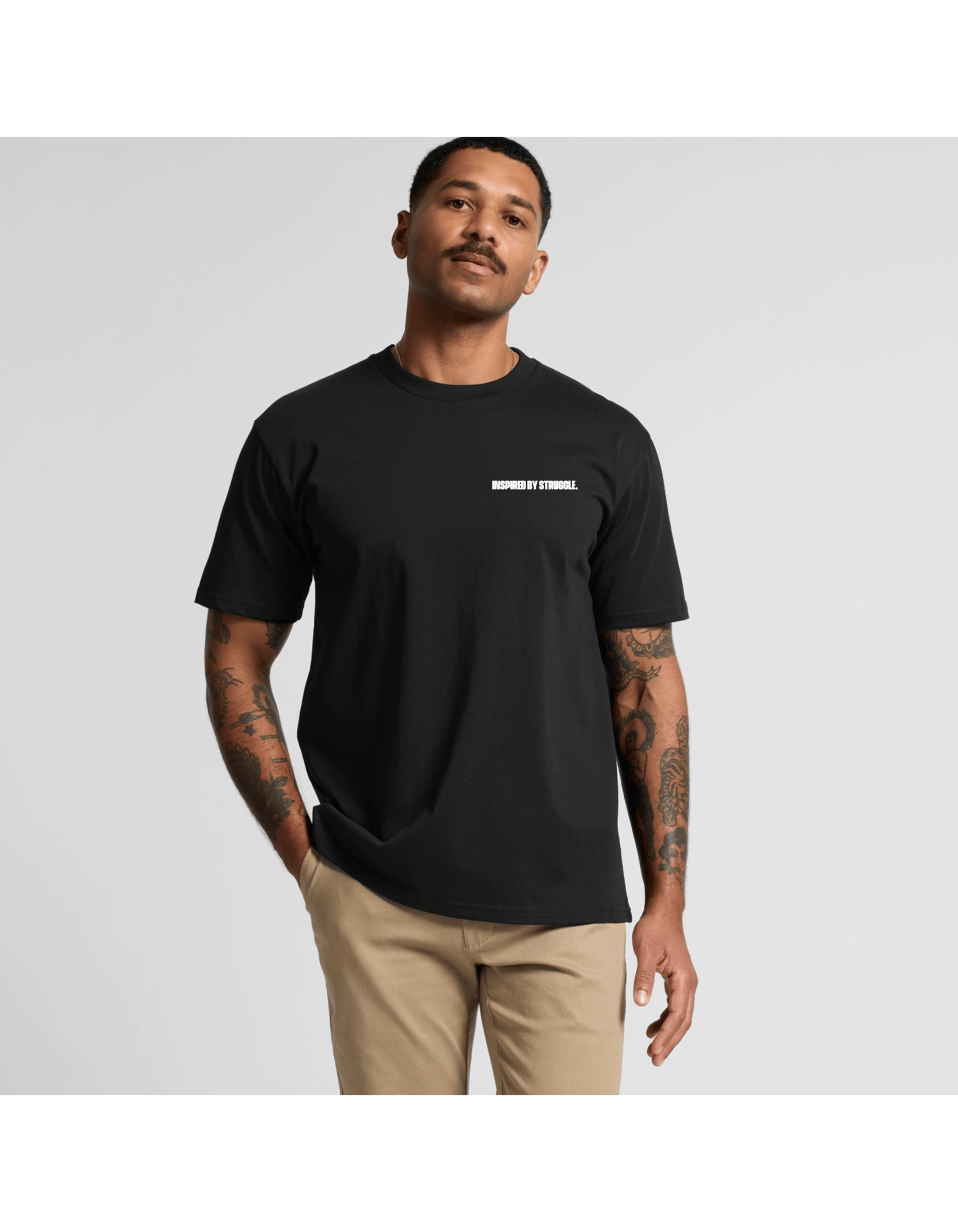 man wearing black crew-neck t-shirt