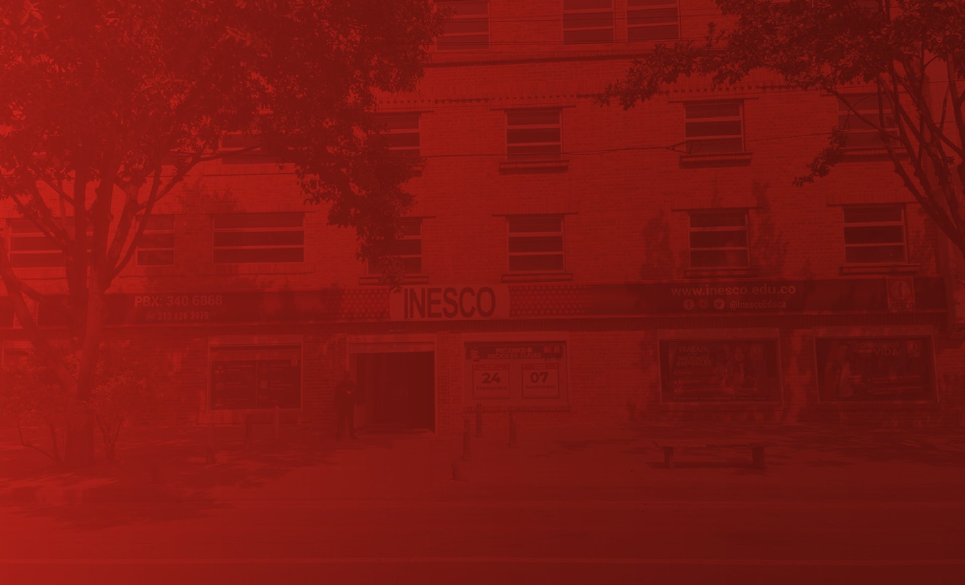 an abstract photo of a curved building with a blue sky in the background