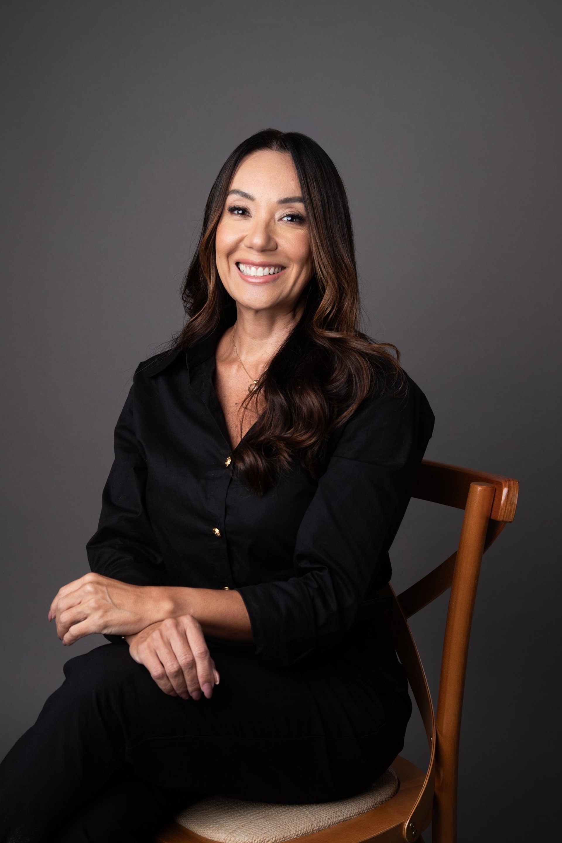 a close up of a black and brown abstract painting