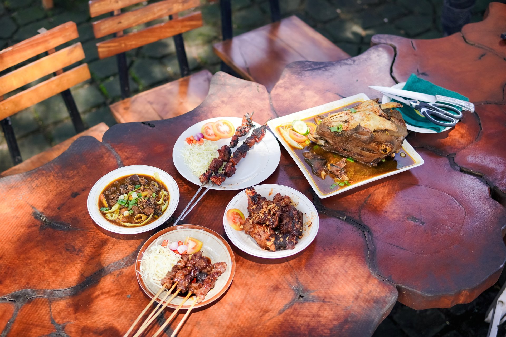 an abstract photo of a curved building with a blue sky in the background