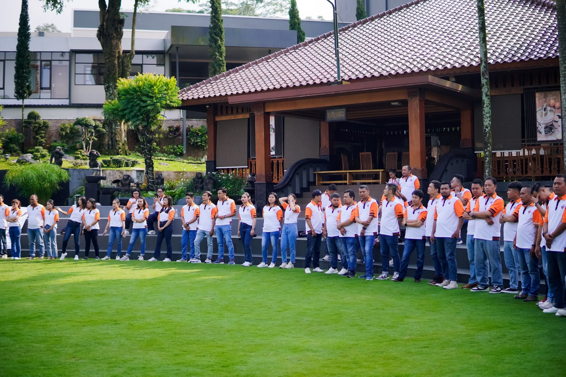 an abstract photo of a curved building with a blue sky in the background