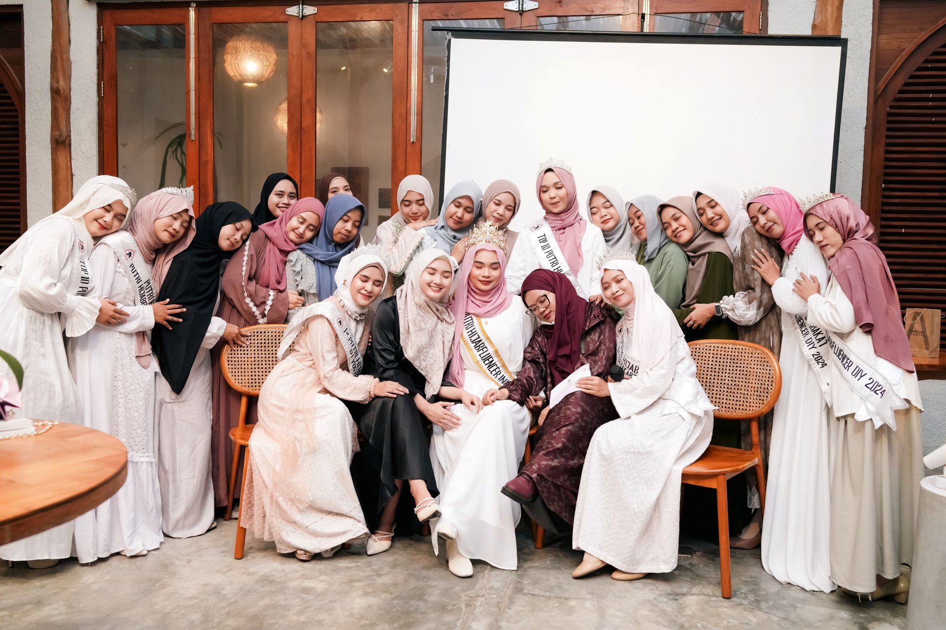 an abstract photo of a curved building with a blue sky in the background