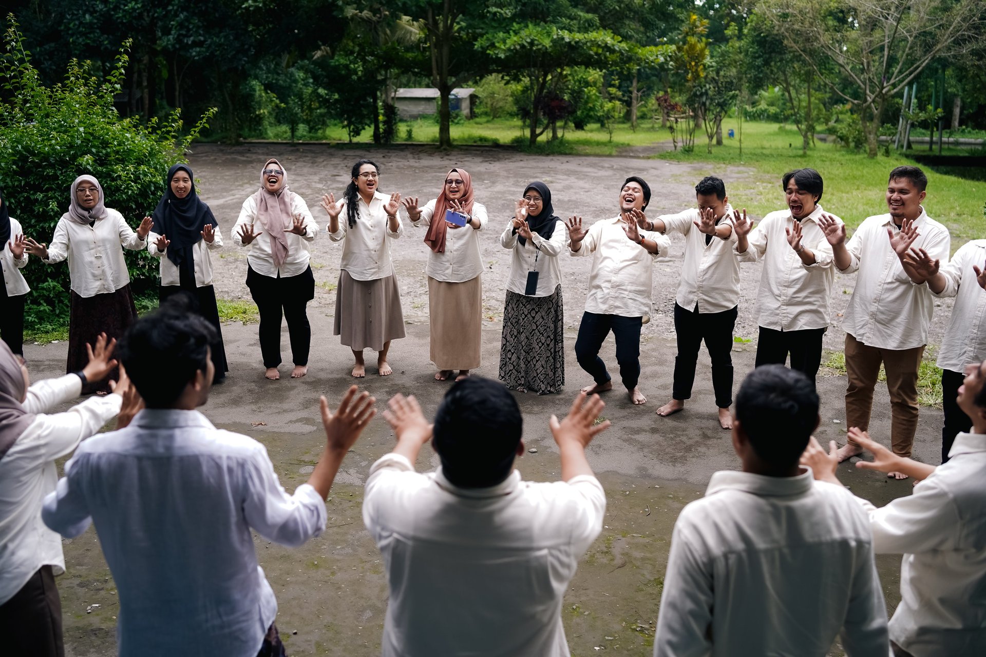 an abstract photo of a curved building with a blue sky in the background