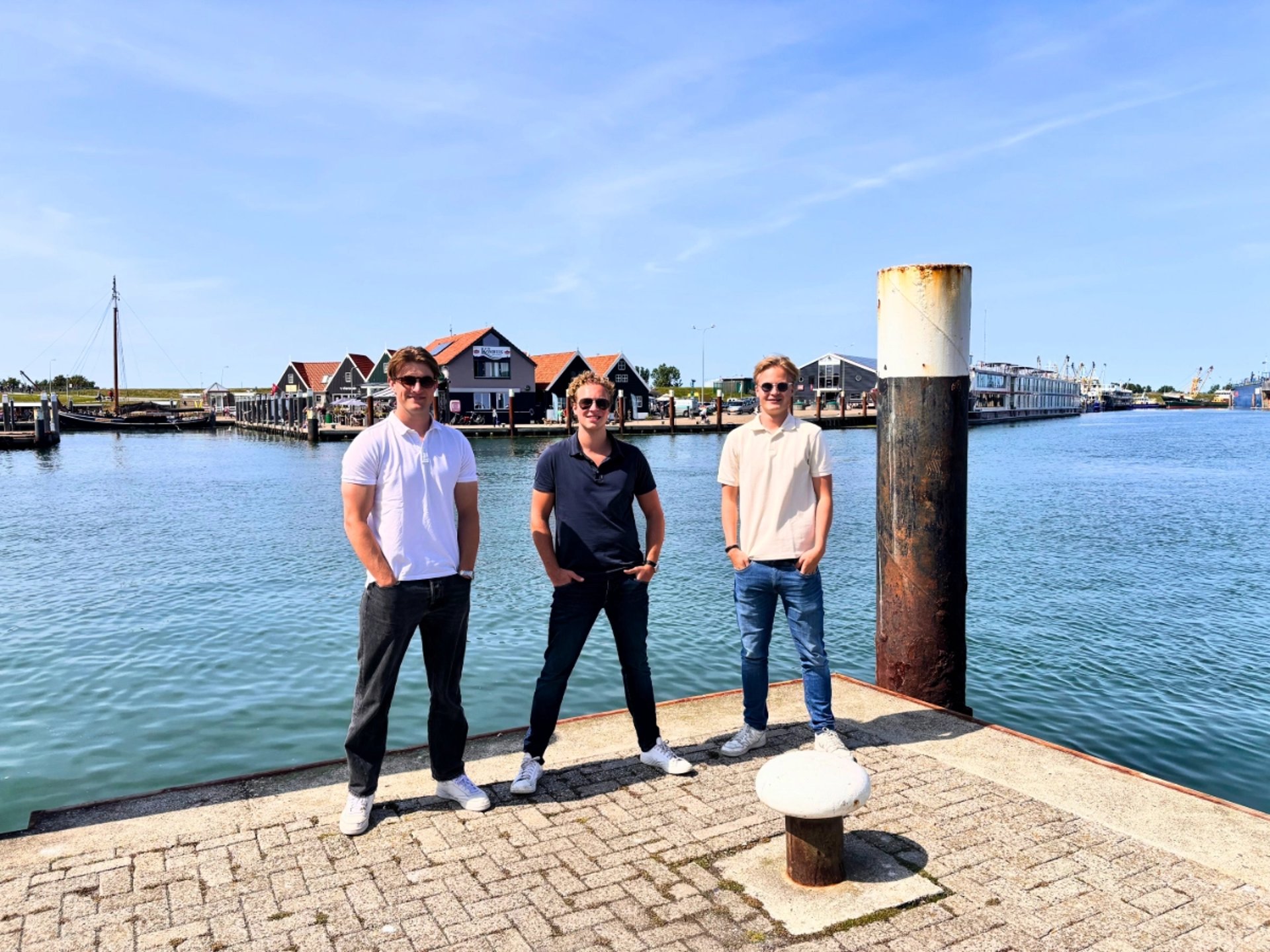 an abstract photo of a curved building with a blue sky in the background