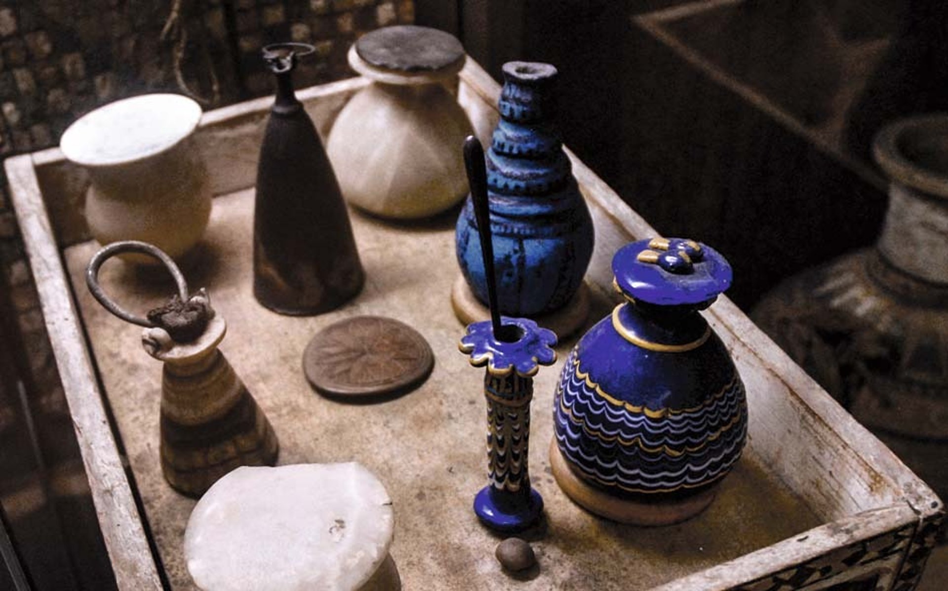 persons feet on blue towel