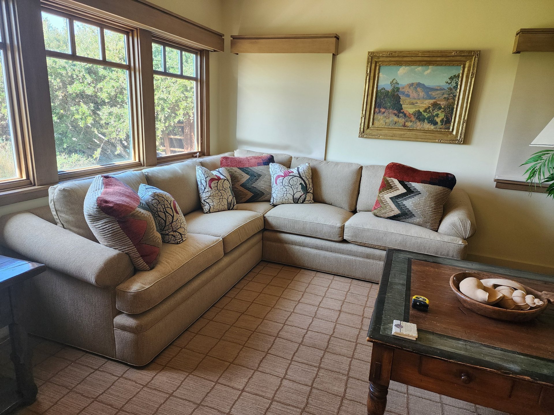 a living room with a couch and a table