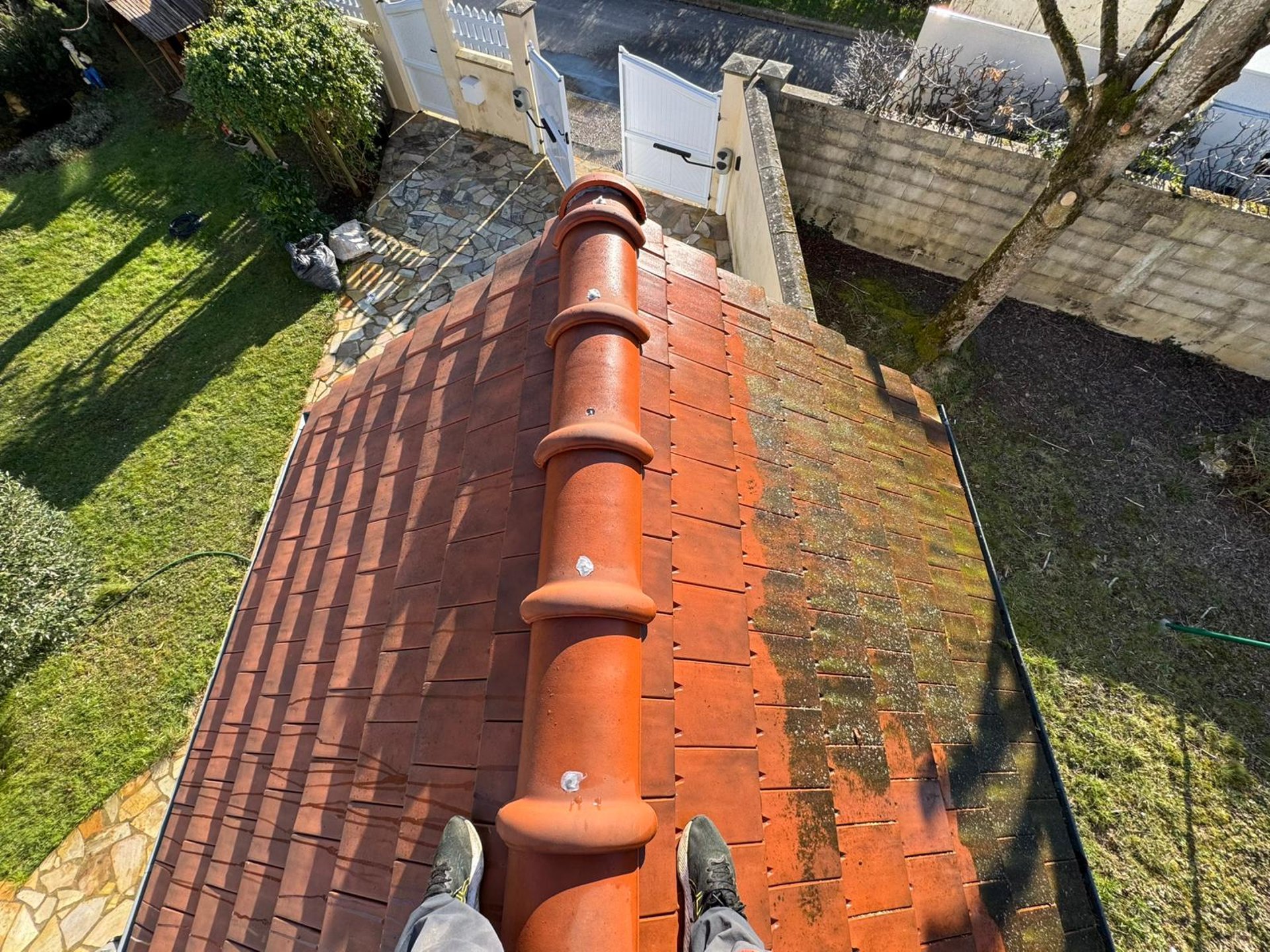 A man on a roof working on a roof