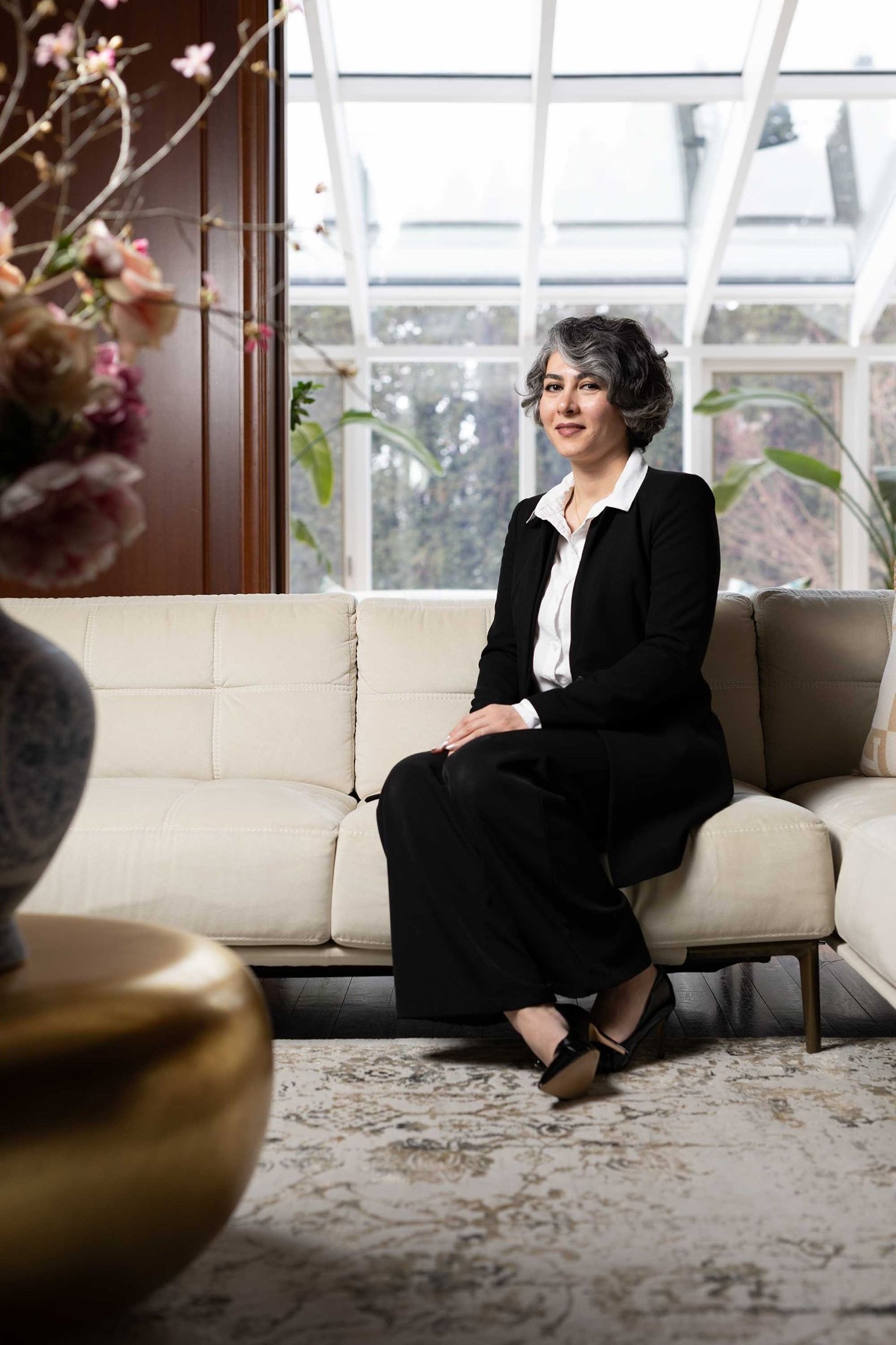 black and brown leather padded tub sofa