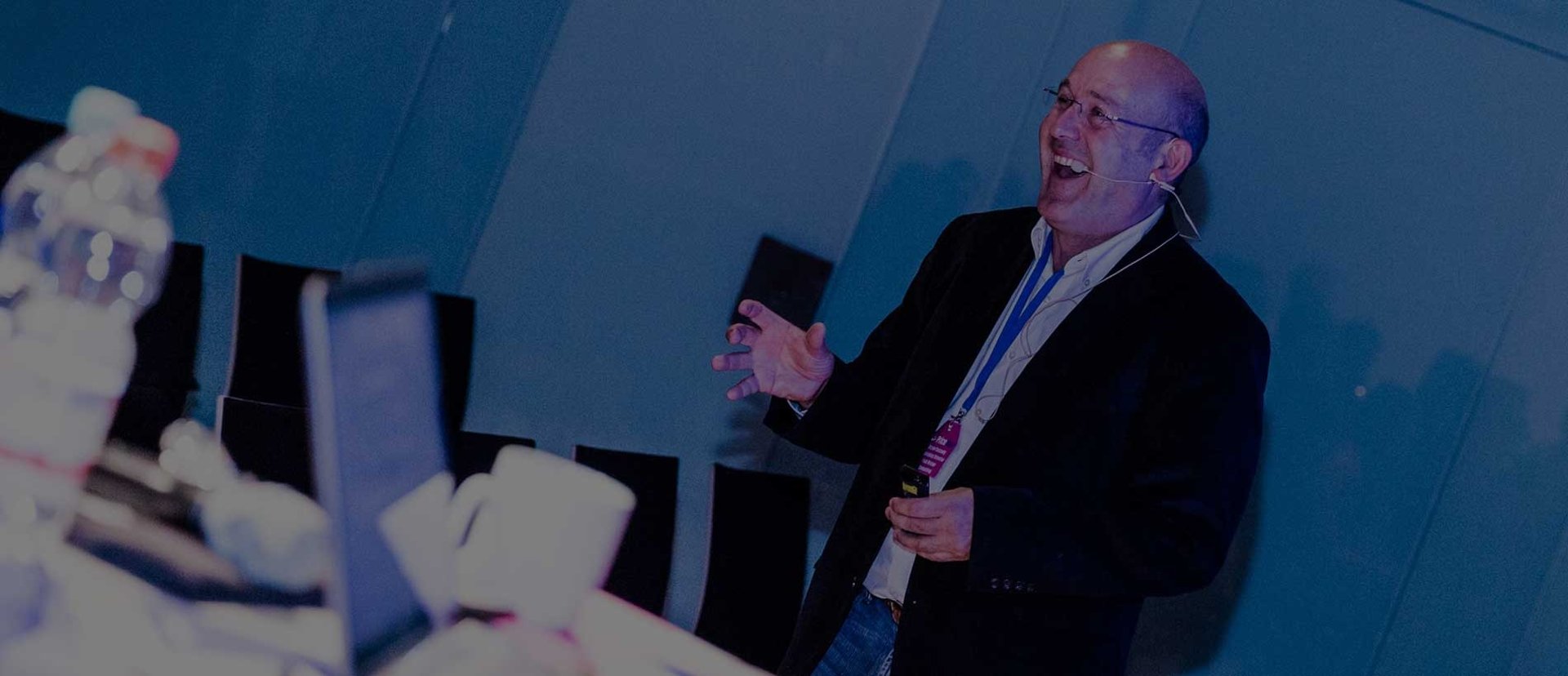 an abstract photo of a curved building with a blue sky in the background