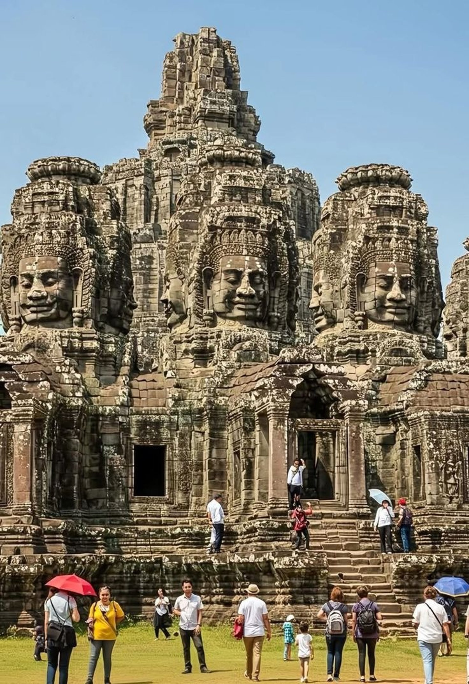 an abstract photo of a curved building with a blue sky in the background
