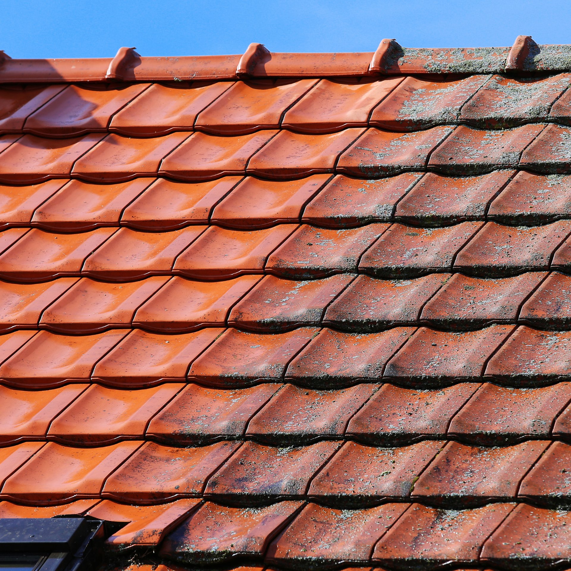 black rectangular device on brown roof