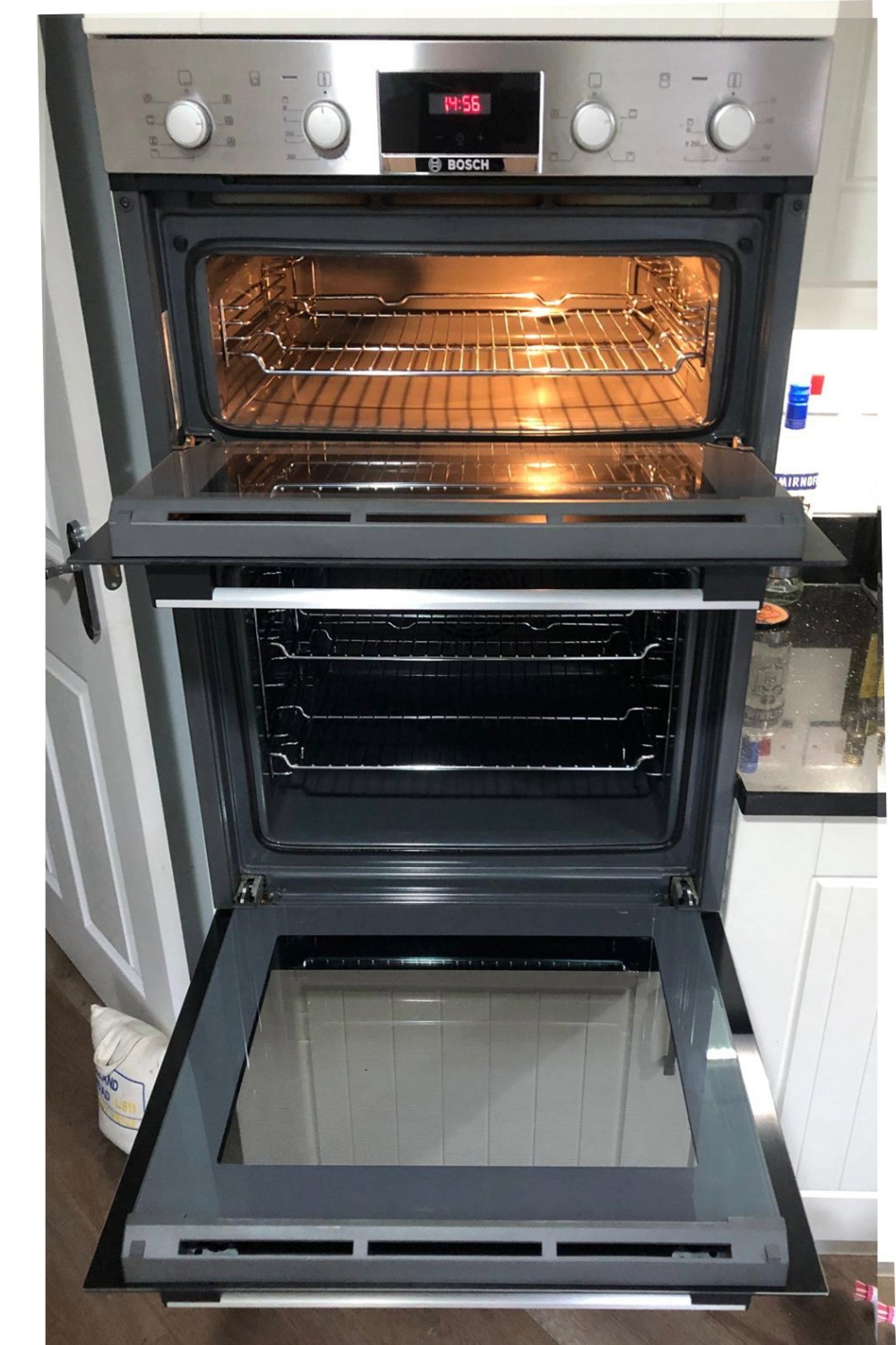 black and brown leather padded tub sofa