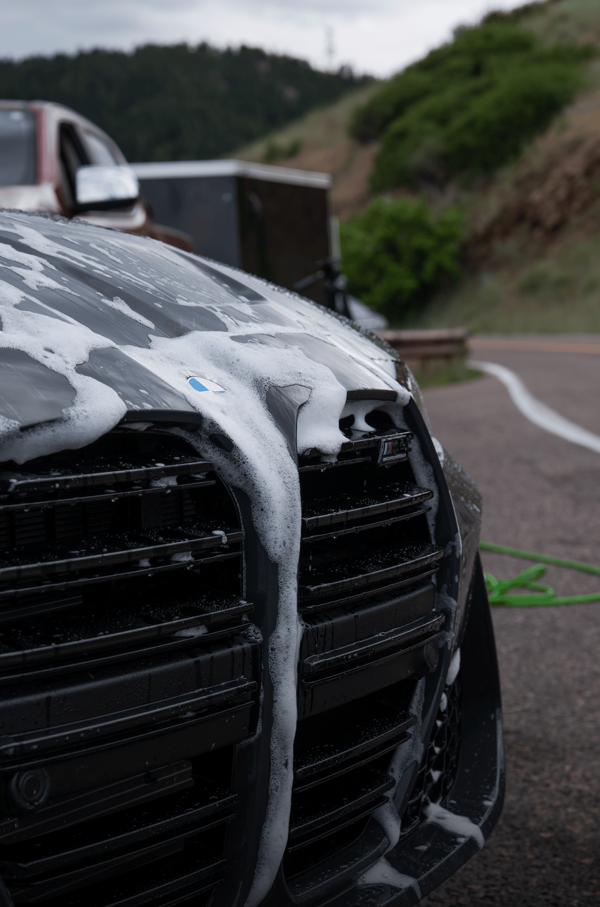 an abstract photo of a curved building with a blue sky in the background