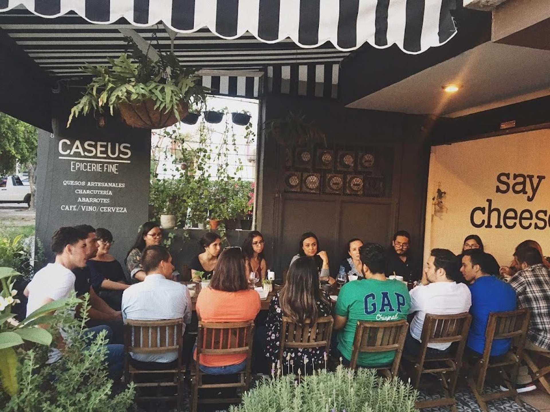 woman wearing yellow long-sleeved dress under white clouds and blue sky during daytime
