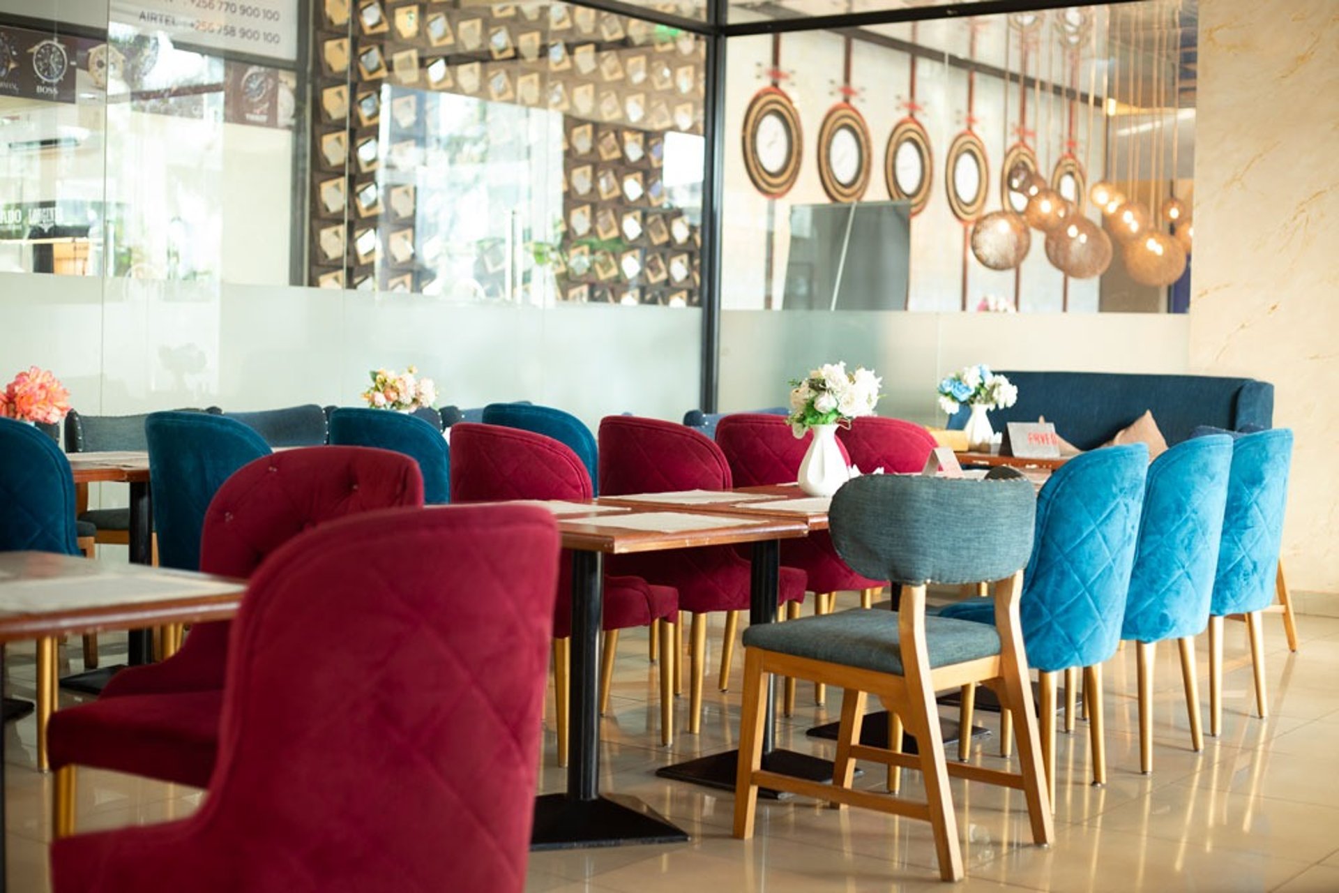 an abstract photo of a curved building with a blue sky in the background